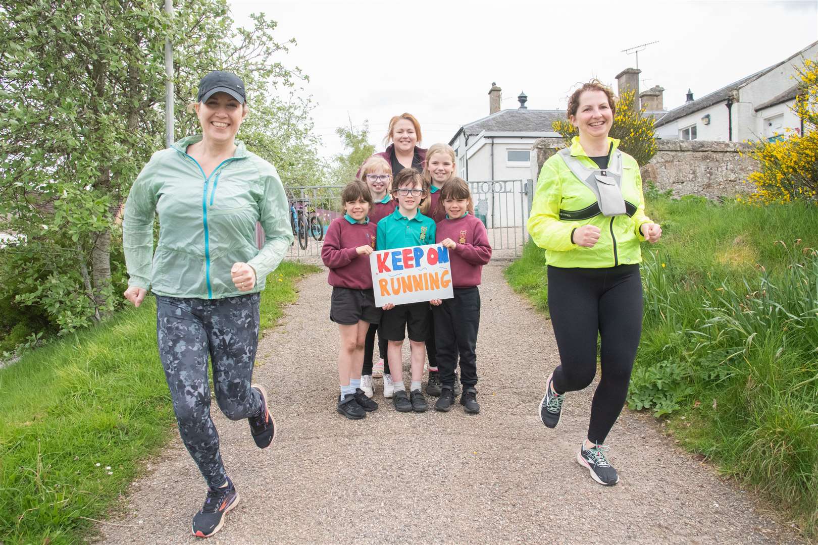 Ailsa Stinson (left) and Fiona Gibson (right) are joined by (clockwise from back) Headteacher Mairi Grant, Aimee Binnie, Amber McDonald, William Caldwell, Aila McDonald and Aila Gibson. Picture: Daniel Forsyth