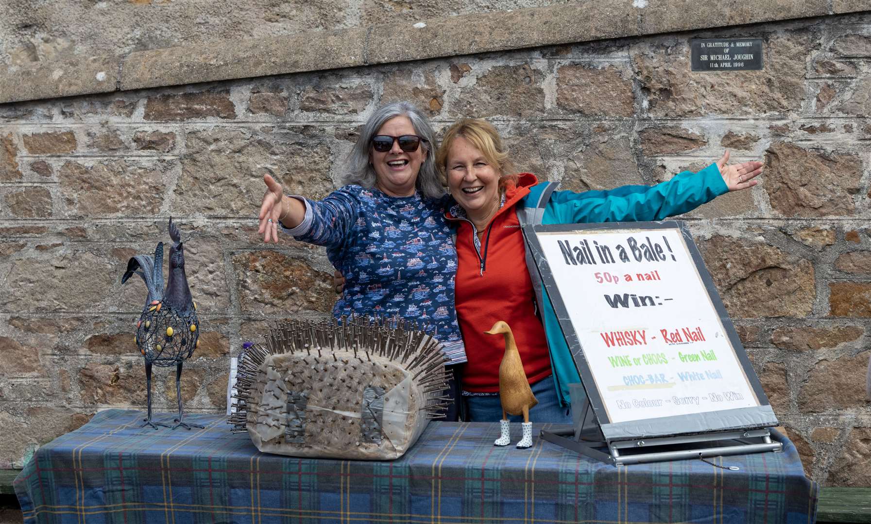 Findhorn Residents Helen Innes and Shona Christie ran the Nail in a Bale stall.