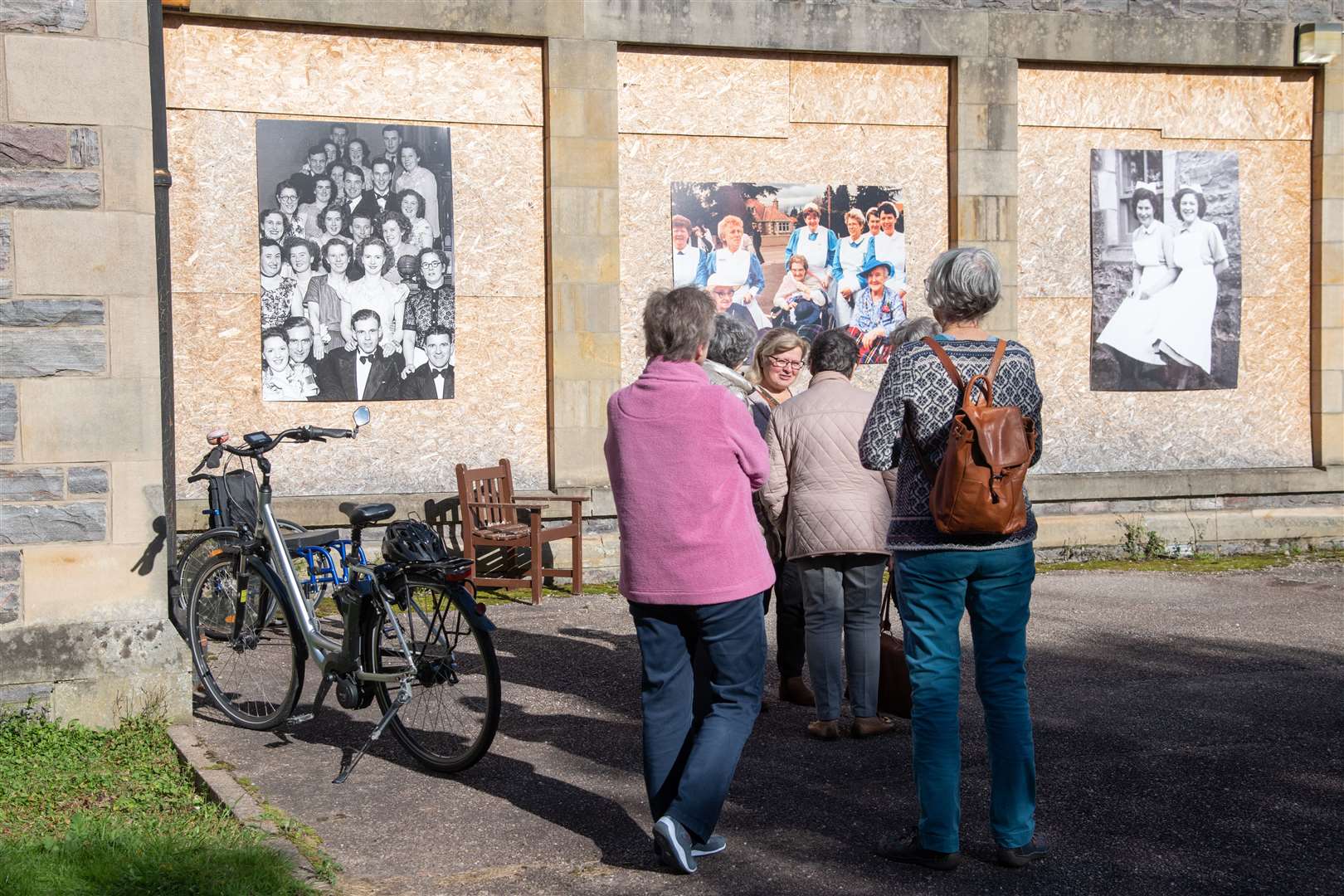 Attendees admiring the photographic display. Picture: Daniel Forsyth