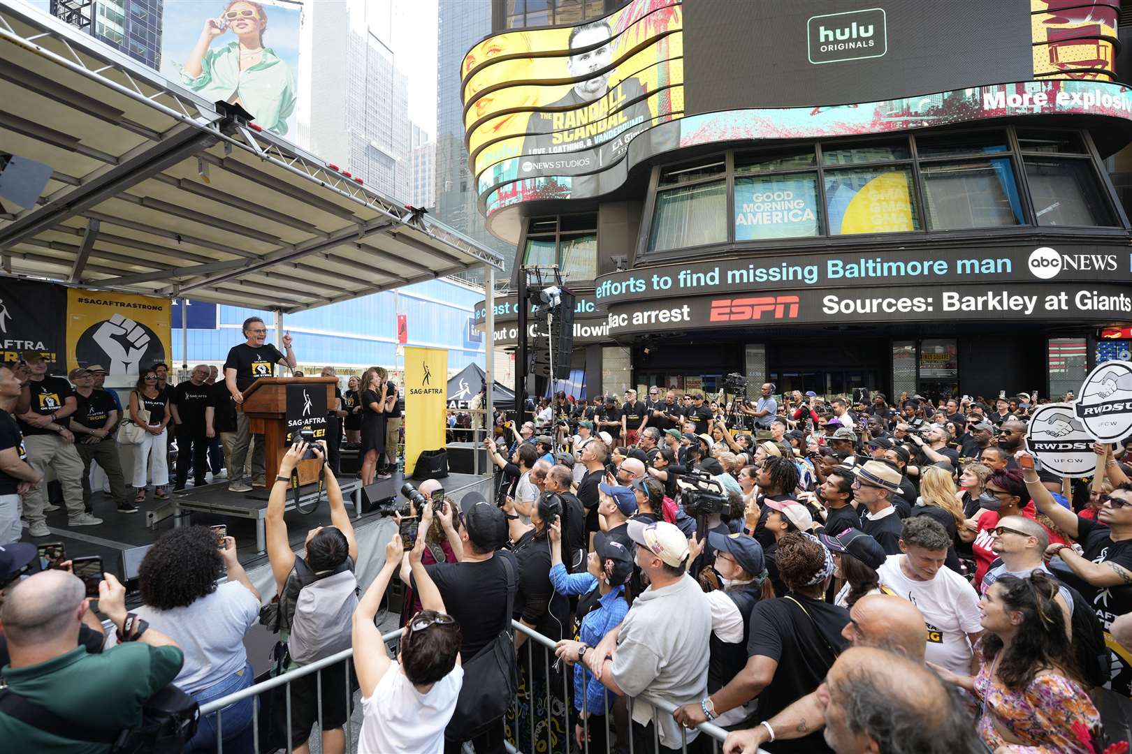 Actor Bryan Cranston speaks during the Sag-Aftra Rock the City for a Fair Contract rally in Times Square in July (Charles Sykes/AP)