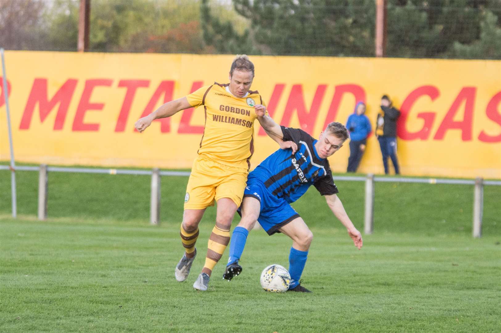 Simon Allan (left) in action for Forres Mechanics during his long Highland League career. Picture: Becky Saunderson..