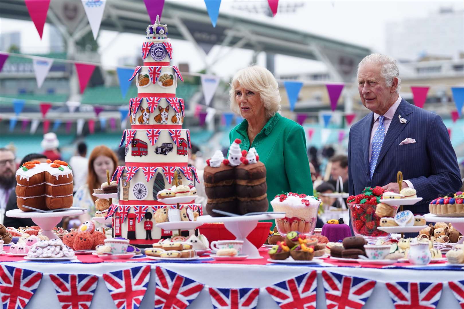 The Prince of Wales and the Duchess of Cornwall attend the Big Jubilee Lunch with tables set up on the pitch at The Oval cricket ground (Stefan Rousseau/PA)