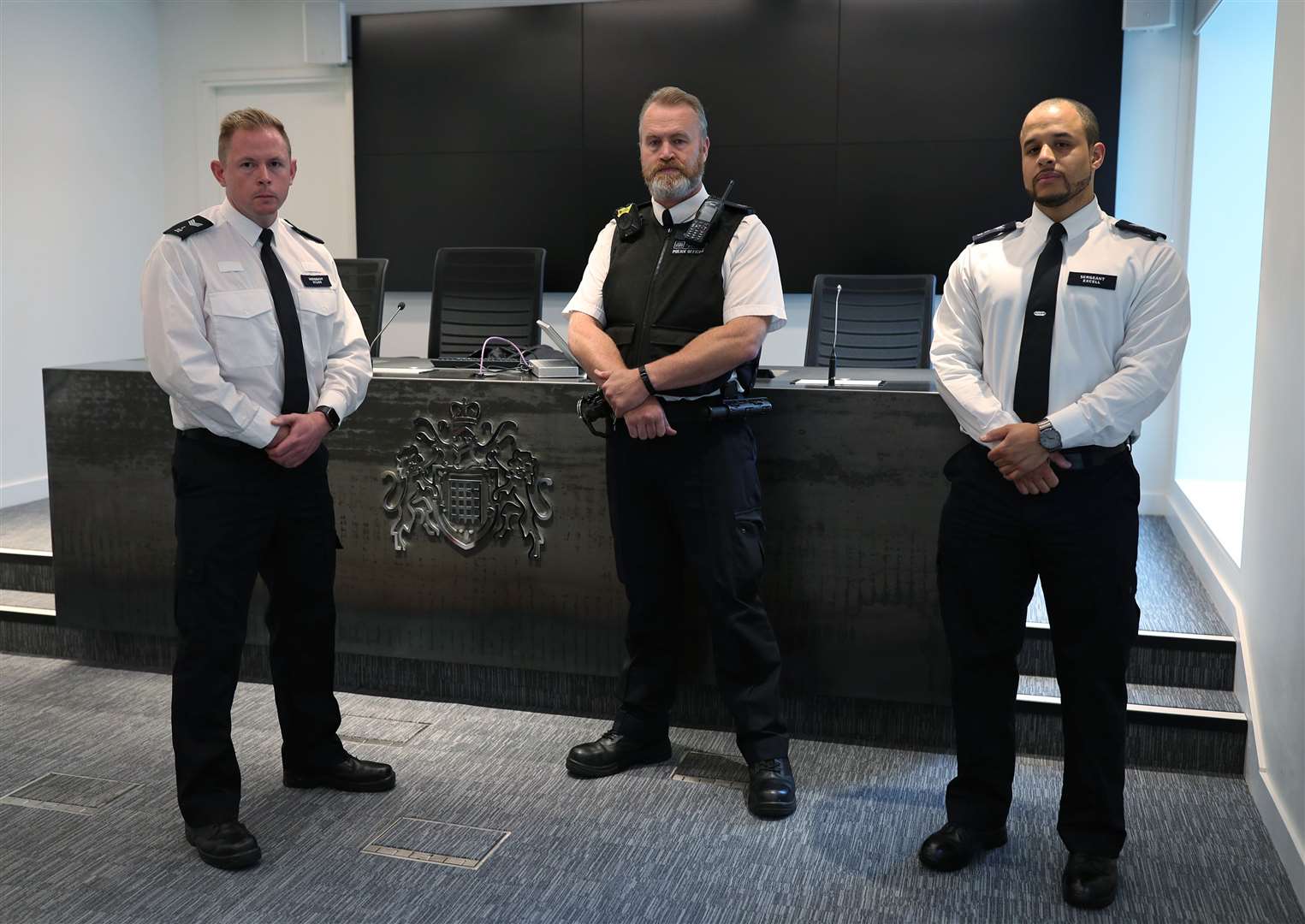 Colleagues of murdered police officer Sergeant Matt Ratana (left to right) Sergeant Gareth Starr, Pc Paul Reading and Sergeant Chris Excell at Scotland Yard (Yui Mok/PA)