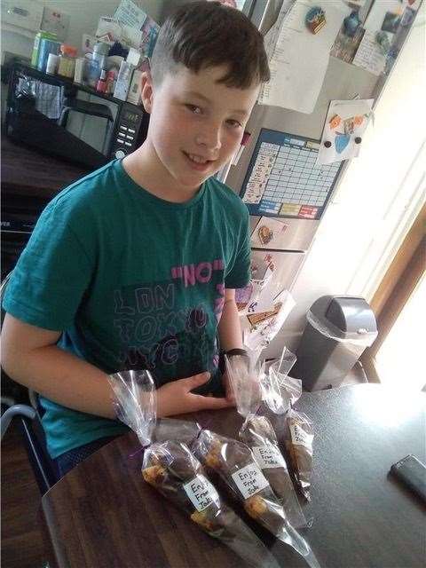 Jake and Dylan Fielding cheered their neighbours with home-baked sweet treats.