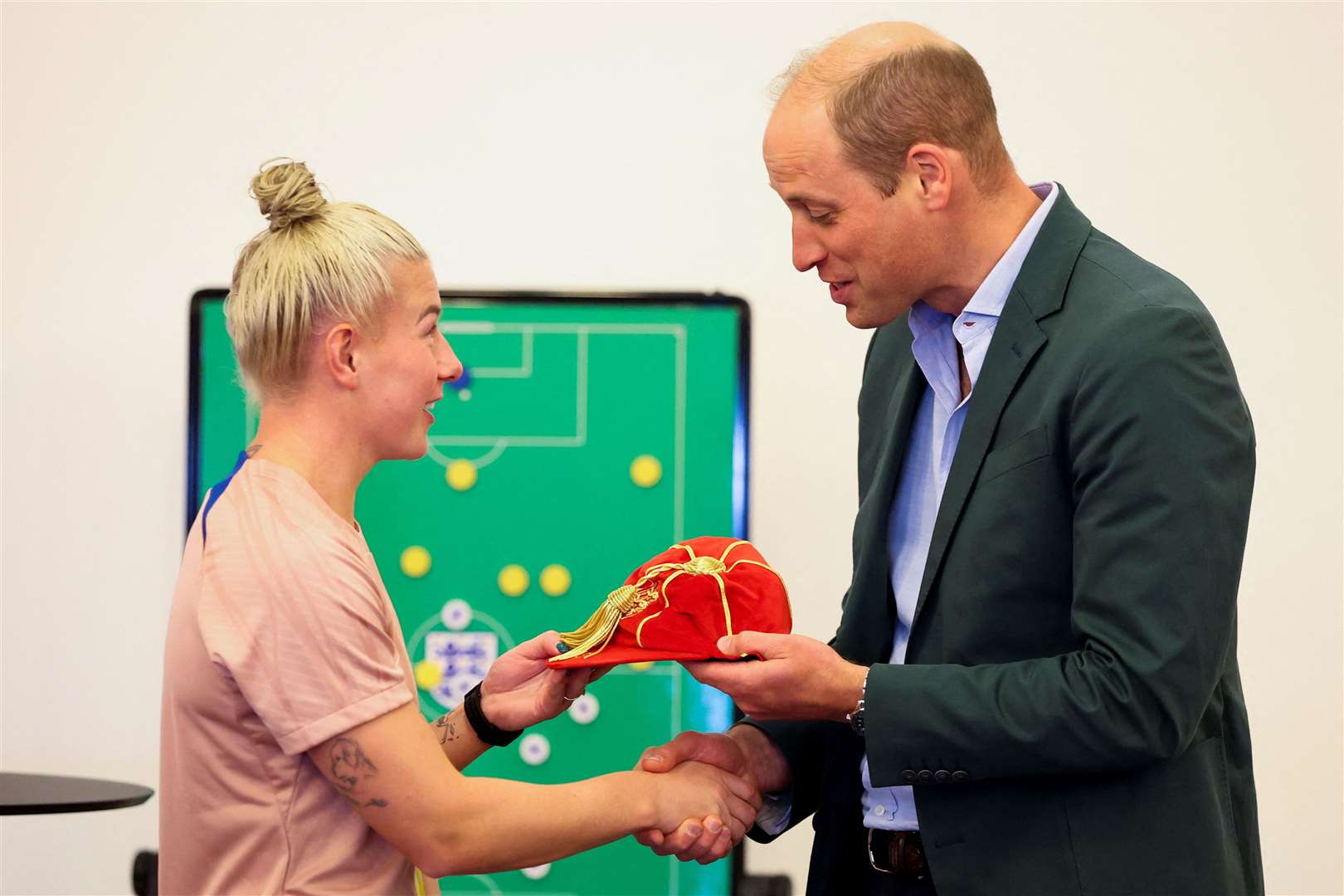 William presents a legacy cap to Bethany England, during a visit to St George’s Park (Phil Noble/PA)