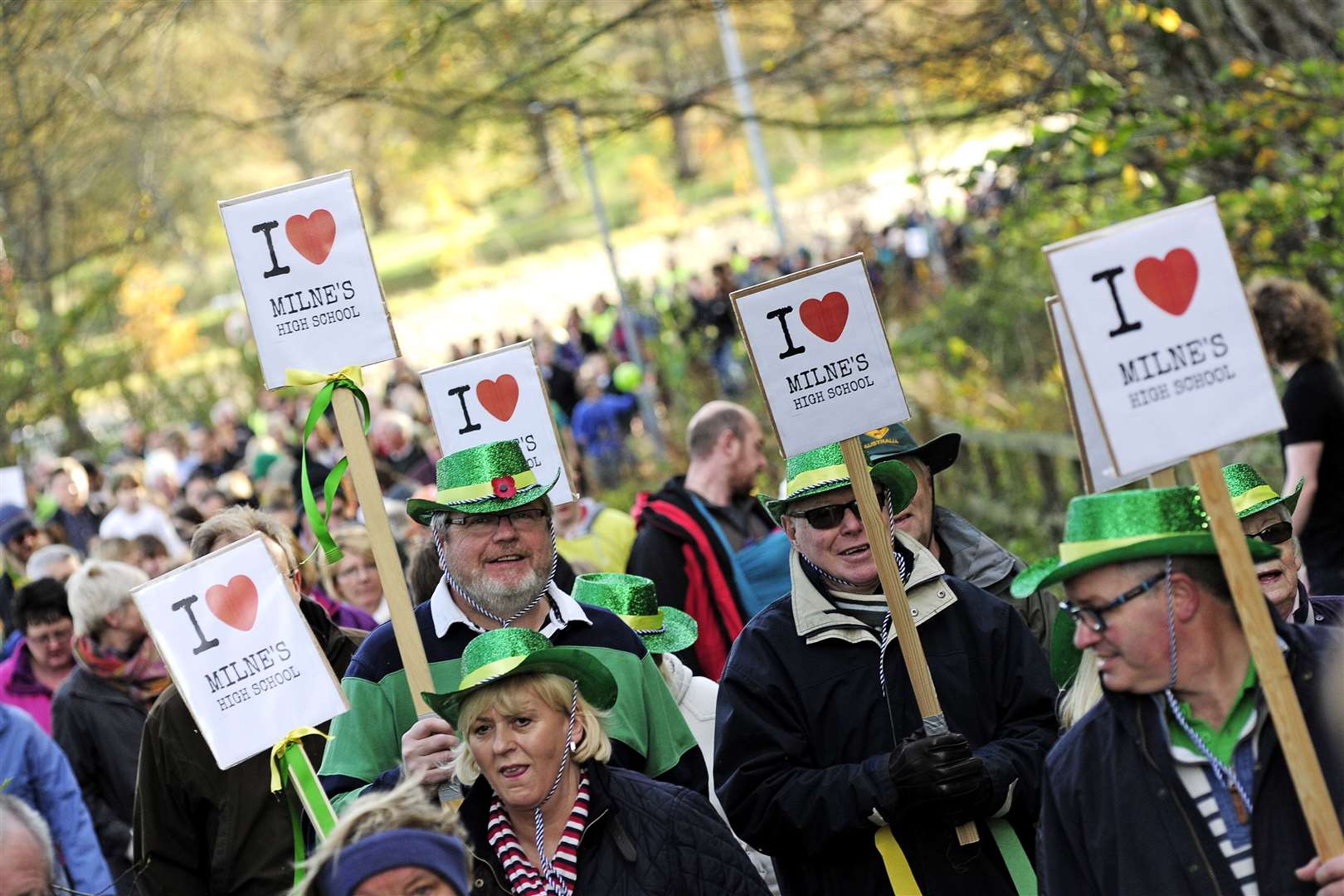 Hundreds of protestors marching through Fochabers in March 2014. Picture: Daniel Forsyth.