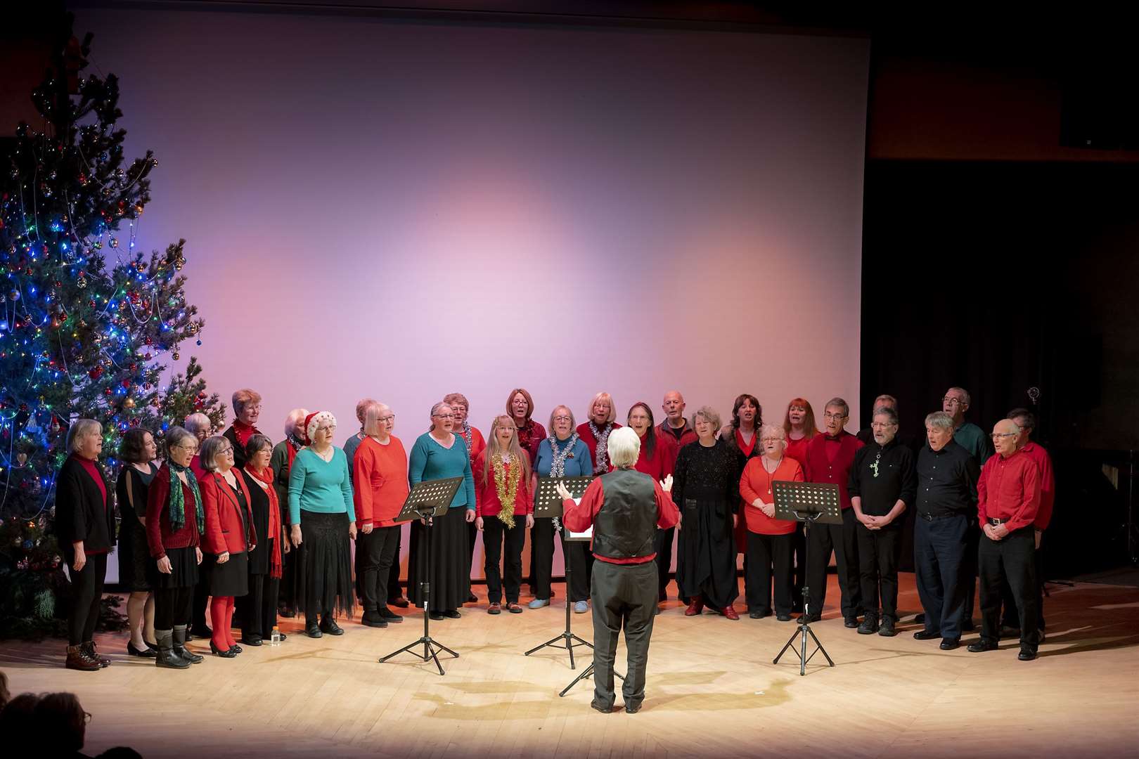 Forres Big Choir performing at Winter Gathering at Universal Hall in 2022 to raise funds for local charities.
