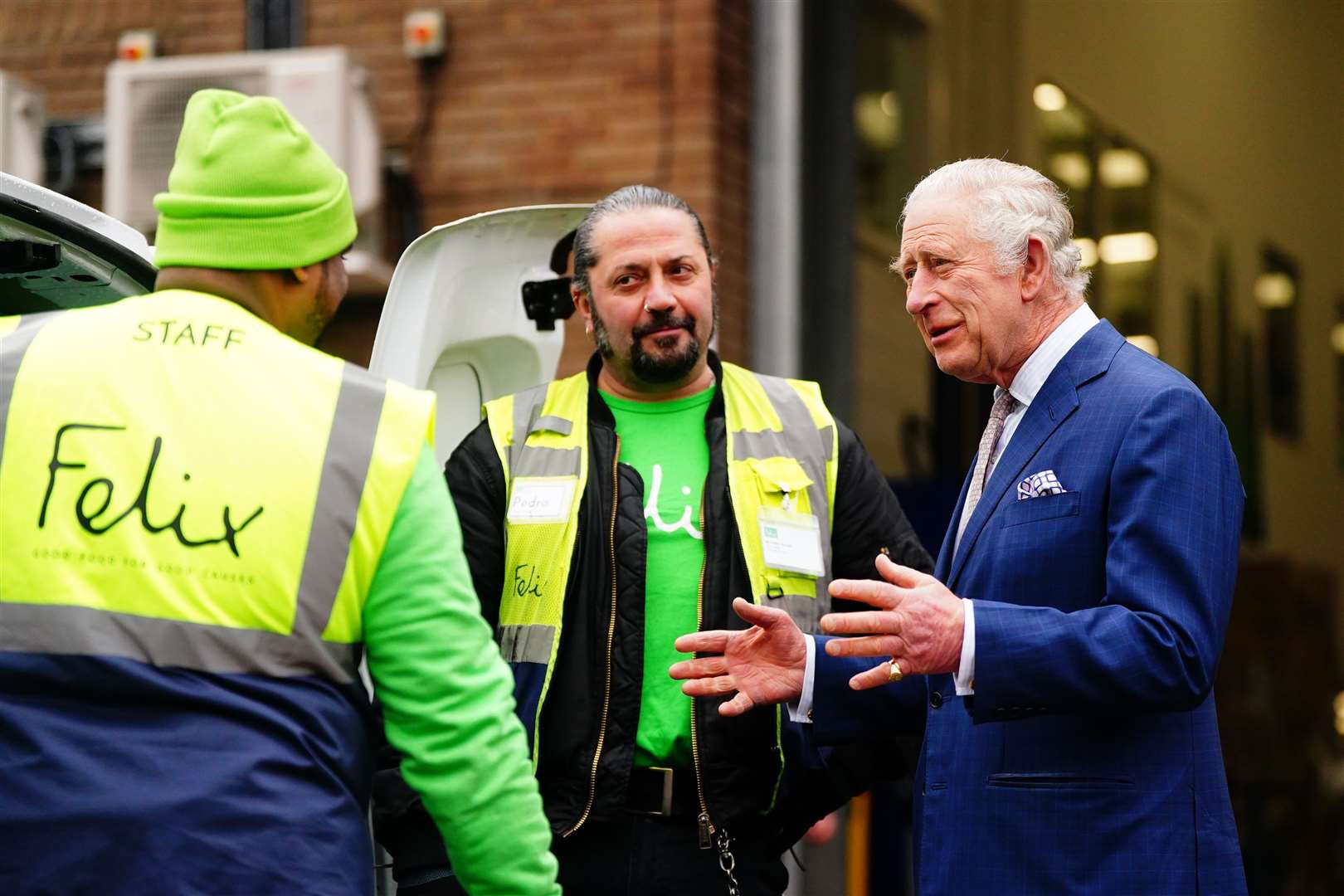 The King talking to food bank delivery drivers during a visit to The Felix Project without the Queen Consort (Victoria Jones/PA)