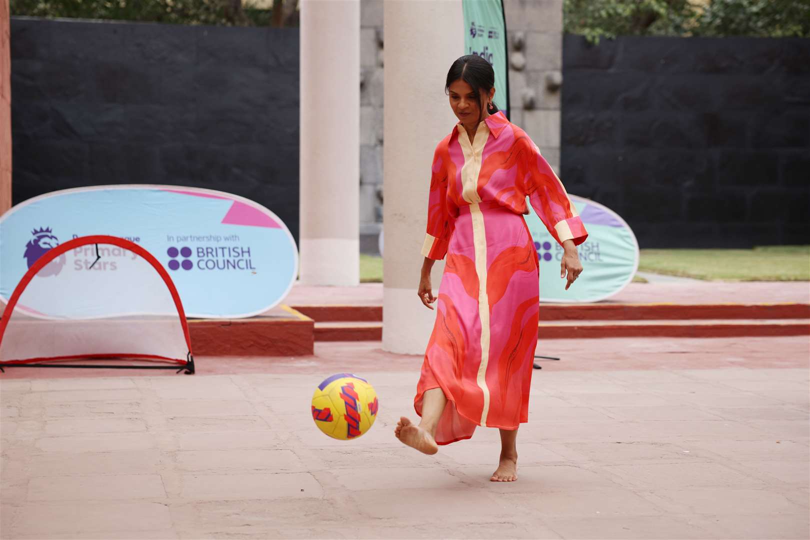 Prime Minister Rishi Sunak’s wife Akshata Murty plays football with local schoolchildren at the British Council (Dan Kitwood/PA)
