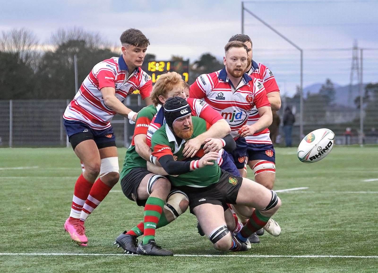 Ewan Simpson tackles. Rory Millar and Kris Morrison in support. Picture: John MacGregor