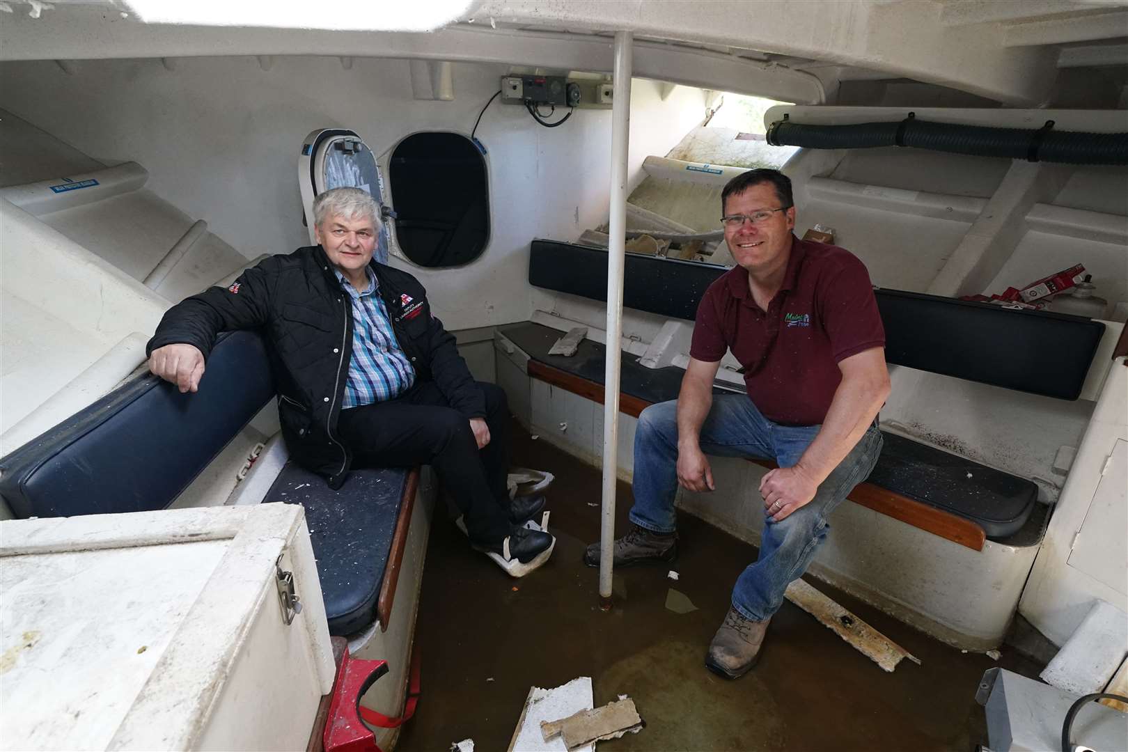 Martyn Steedman with retired RNLI coxswain David Buchan in the front survivors cabin on the boat (Andrew Milligan/PA)