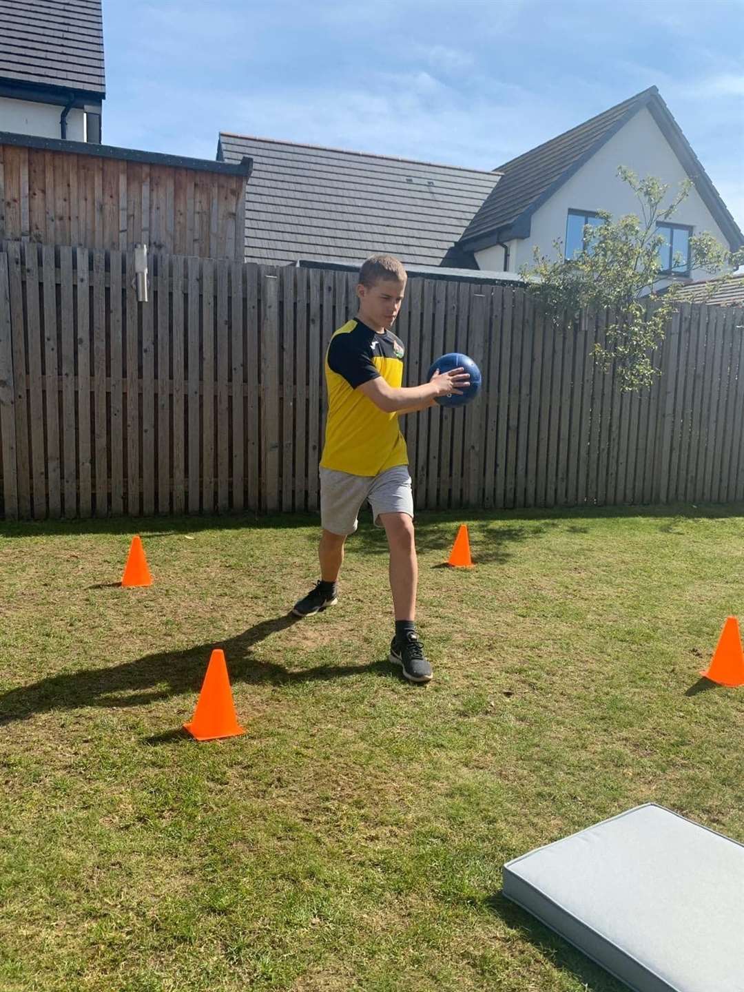 Grant Napier working out in his back garden.