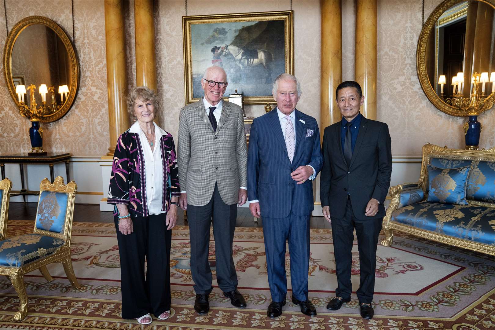 The King receives Sue Leyden, daughter of expedition leader Lord Hunt, Peter Hillary (second left), son of Sir Edmund Hillary, and Jamling Norgay, son of Sherpa guide Tenzing Norgay, during an audience at Buckingham Palace (Victoria Jones/PA)