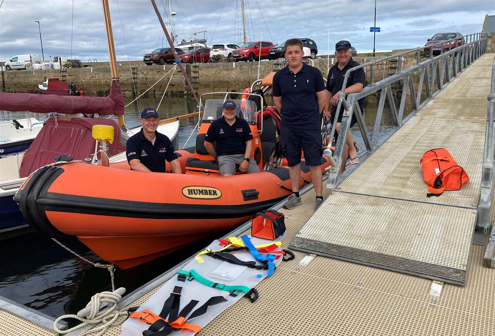 Zander Craib pictured with the crew at Moray Inshore Rescue Organisation.