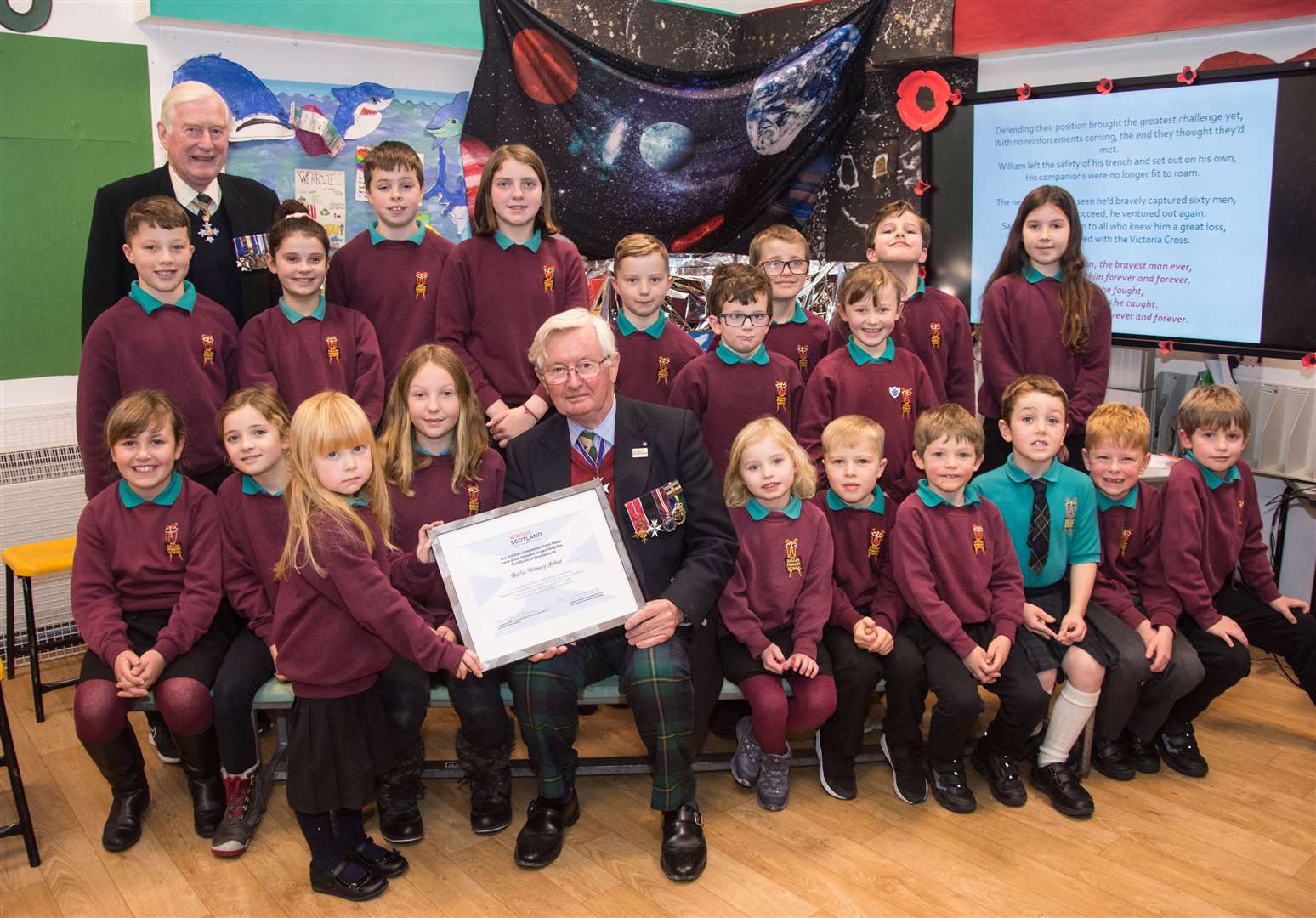 Lord Lieutenant Grenville Johnston hands over the WW1 Commemoration Certificate to Dallas Primary...Dallas Primary held a small event about World War One...Picture: Becky Saunderson..