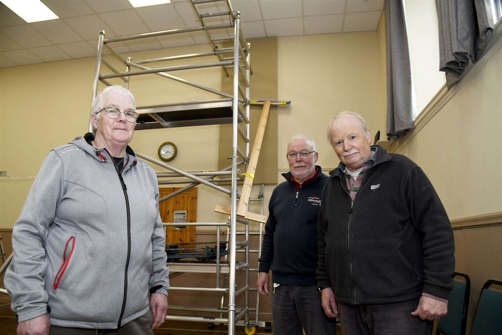 Jane Kelso, Hamish Grigor and Bob James installing acoustic panels as part of the James Milne Institute’s renovations.