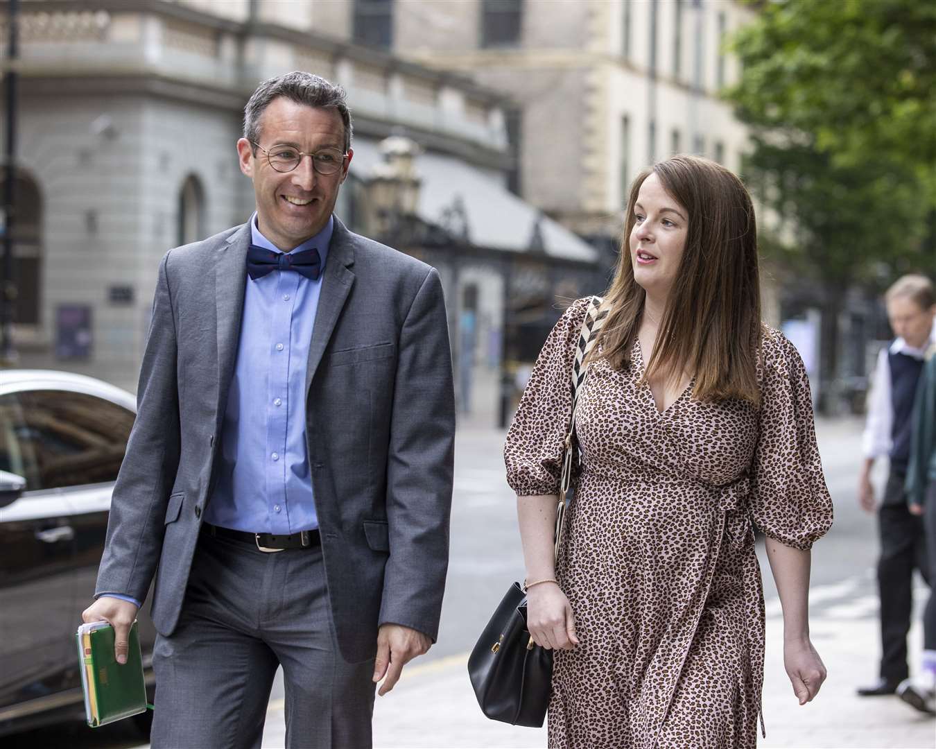 Andrew Muir and Nuala McAllister of the Alliance party arrive for talks (Liam McBurney/PA)