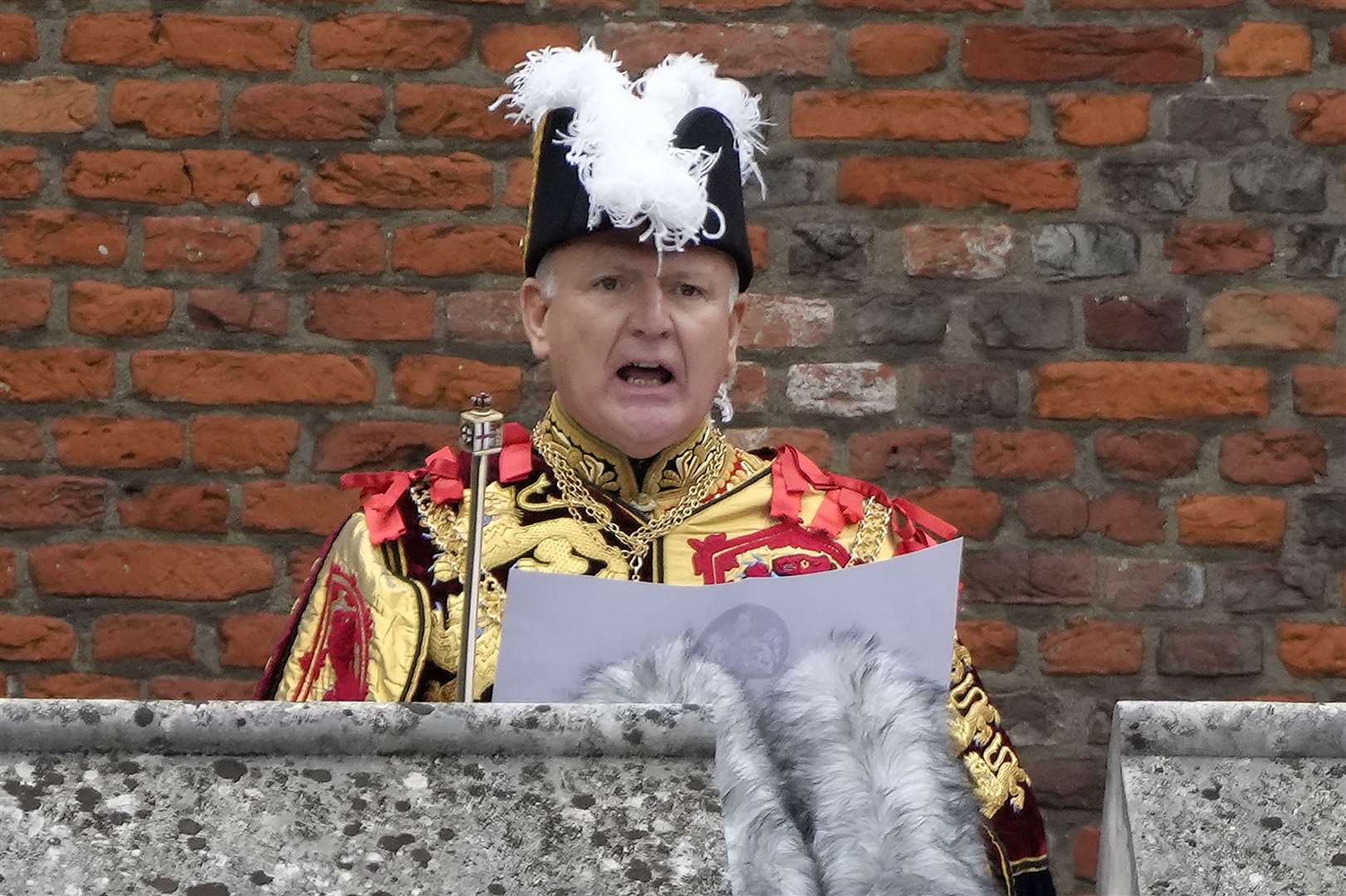 Garter Principle King of Arms, David Vines White reads the proclamation of the new King from the Friary Court balcony of St James’s Palace (Kirsty Wigglesworth/PA)