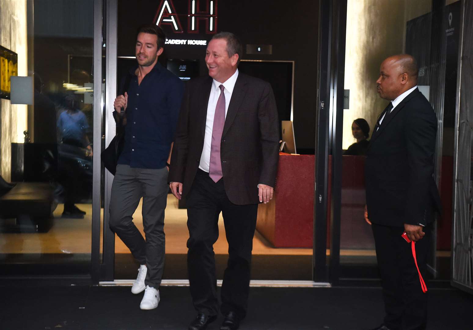 Mike Ashley (right) leaving the Sports Direct headquarters in London with chief executive officer Michael Murray (Kirsty O’Connor/PA)