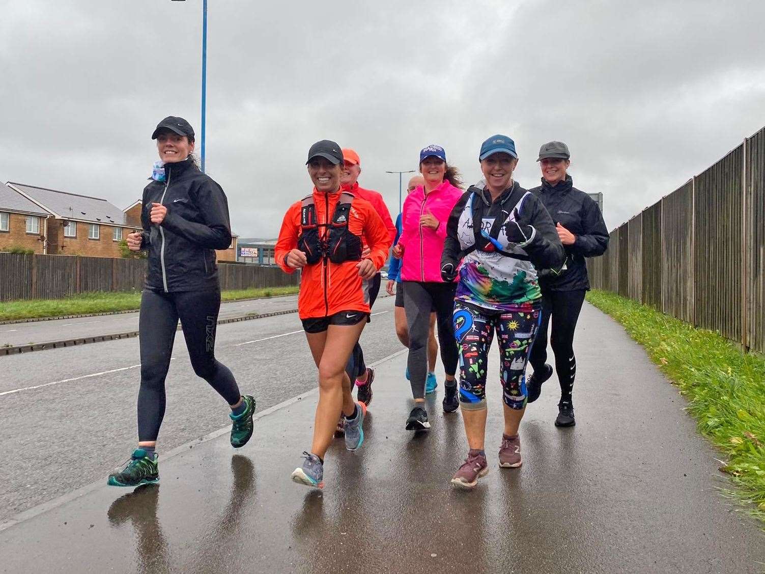Andrea Bradley (second right) completing the 2020 virtual London Marathon in Neath, Wales (Family handout/PA)