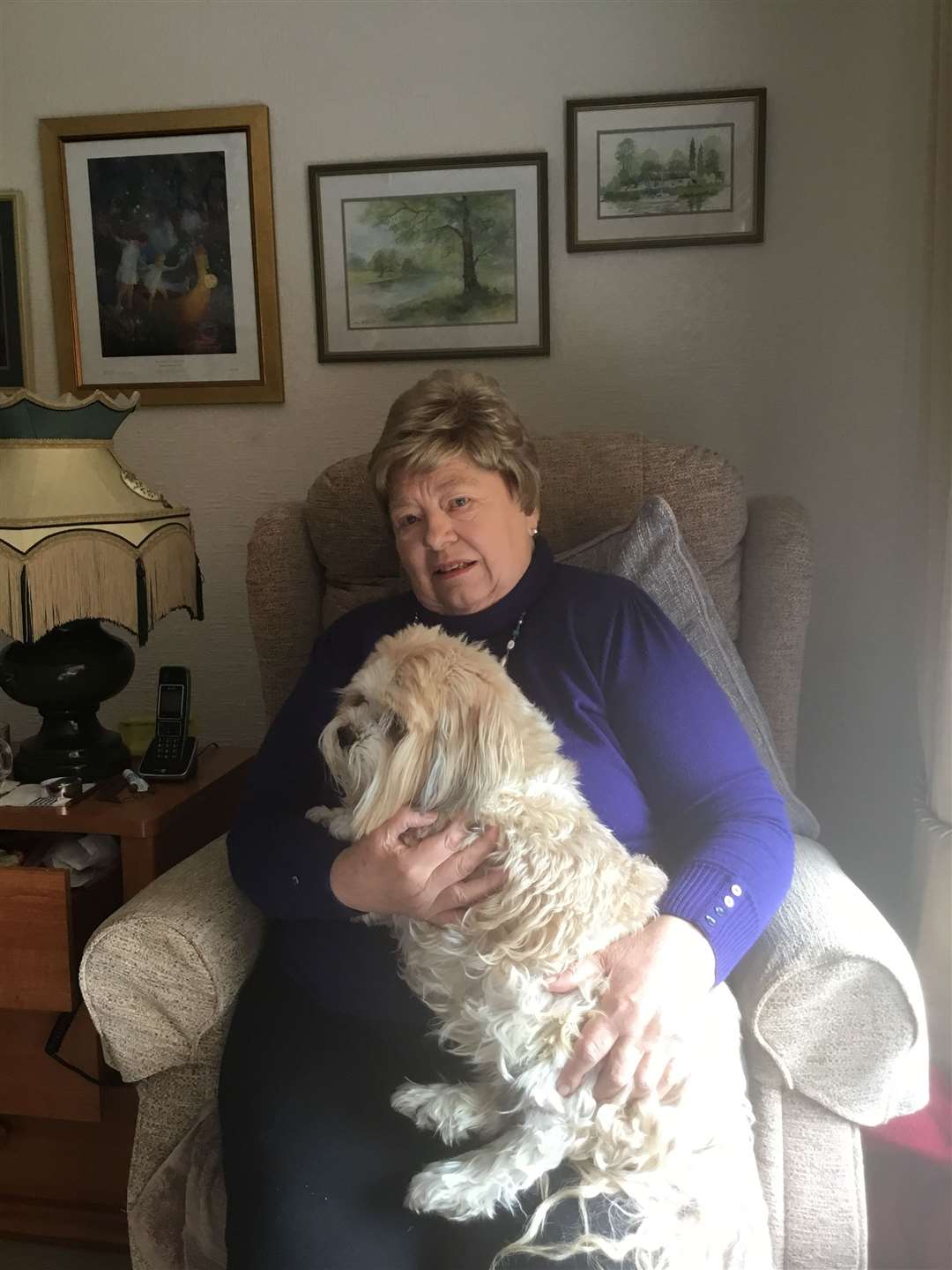 Dorothy now at home with her dog Laird.