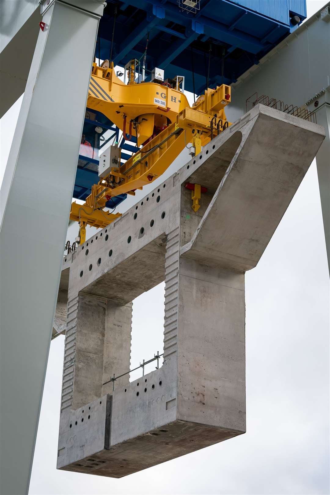 A concrete segment is carried by a crane at the HS2/Align Compound (Aaron Chown/PA)