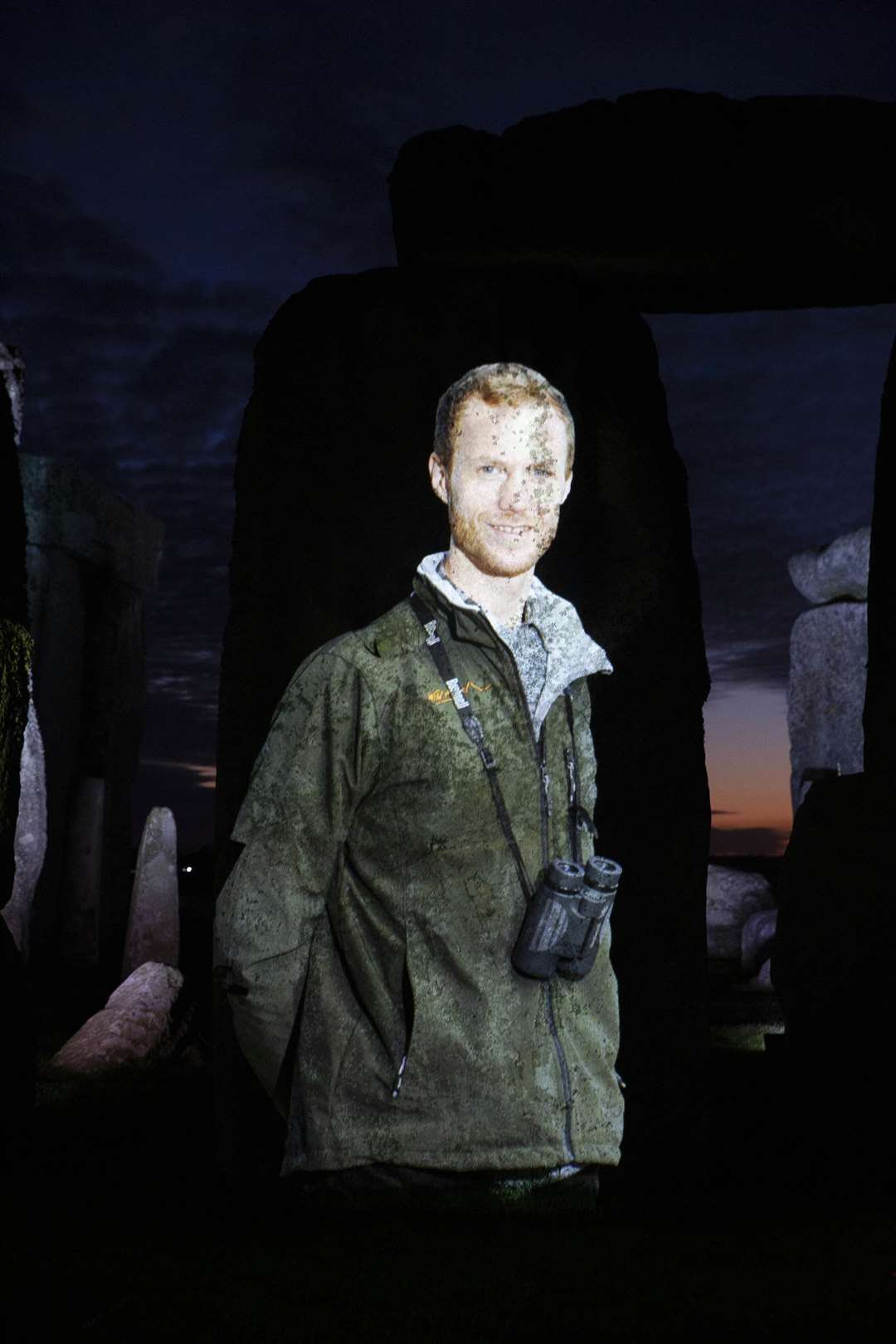 An image of Luke Strachan, chief executive of Findhorn-based Wild Things, is projected onto the standing stones at Stonehenge to honour his work in UK heritage. Picture: Matt Alexander/PA Wire.