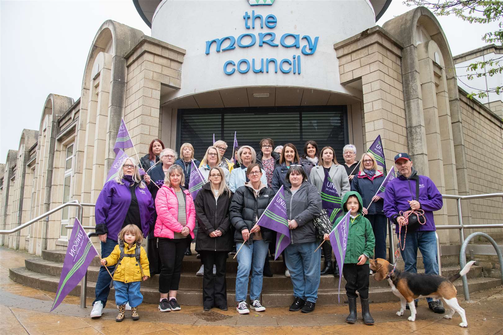 Unison members gather outside the Moray Council Annexe at a recent protest to oppose cuts to office jobs at schools and nurseries. Picture: Daniel Forsyth