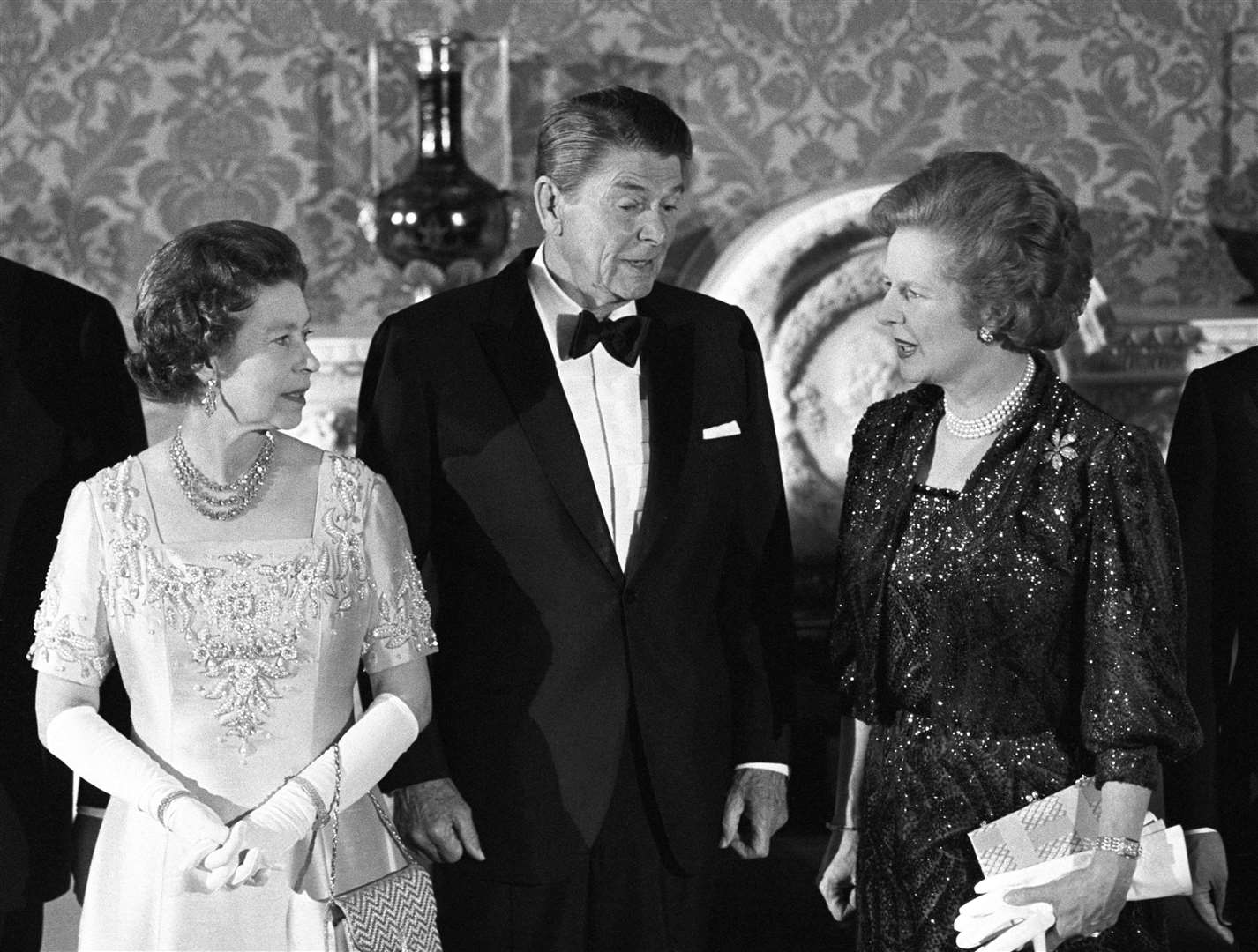 The Queen, former US president Ronald Reagan and then-PM Margaret Thatcher at Buckingham Palace (PA)