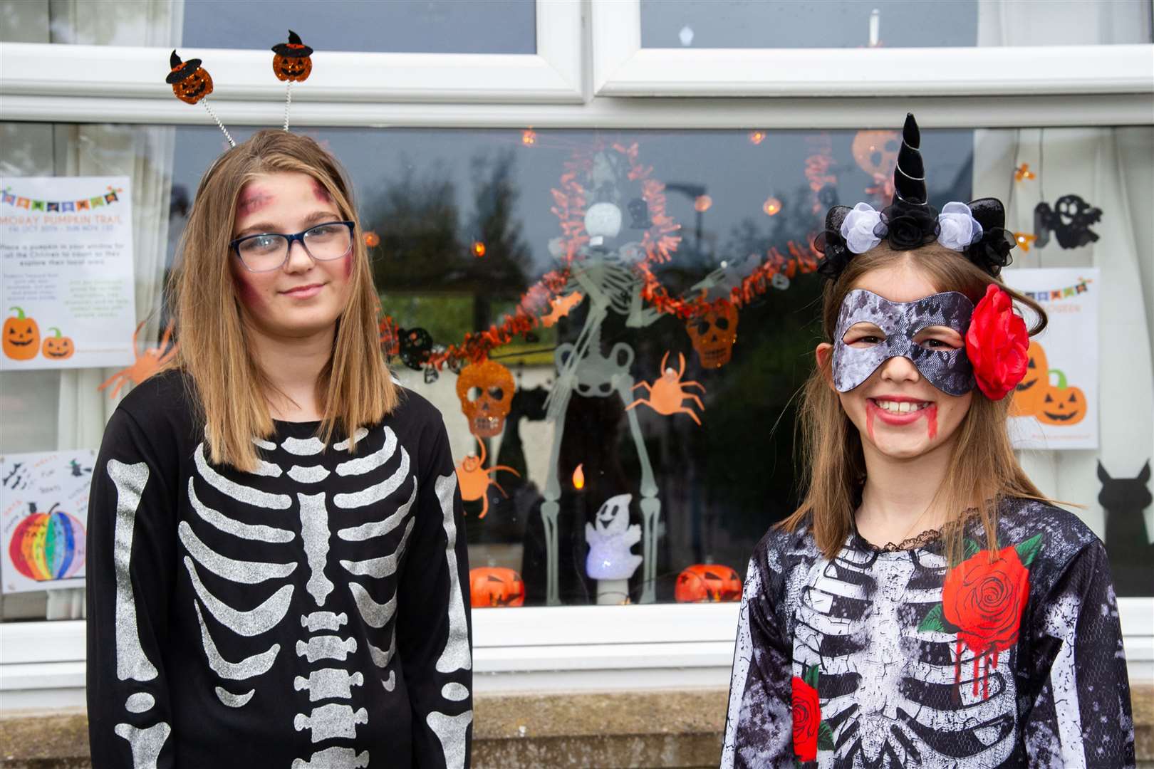 Becky and Debbie Vaccaro...Emma Vaccaro is organising a Halloween event in Moray - with posters to be stuck up in windows and kids to get sweeties from their parents when spotting posters. .Picture: Daniel Forsyth..