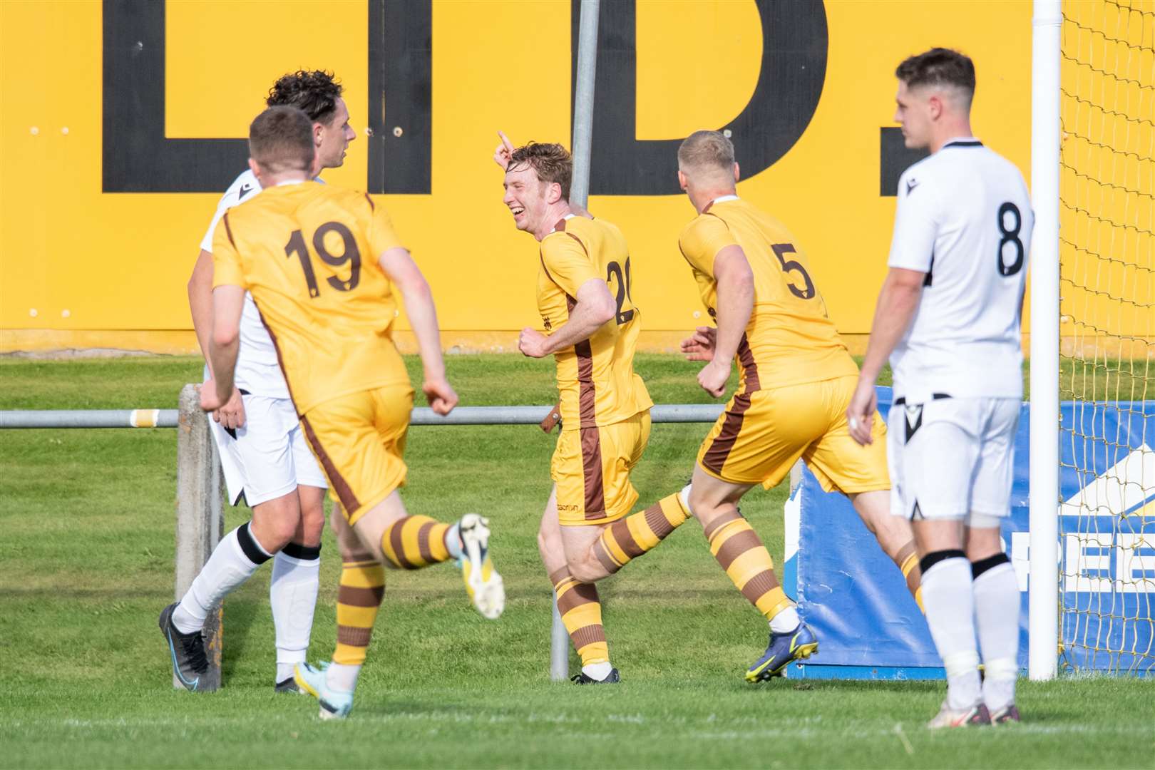 #20 Connall Ewan celebrates scoring Forres' third goal of the afternoon. ...Forres Mechanics FC (4) vs Rothes FC (3) - Highland Football League 22/23 - Mosset Park, Forres 01/10/2022...Picture: Daniel Forsyth..
