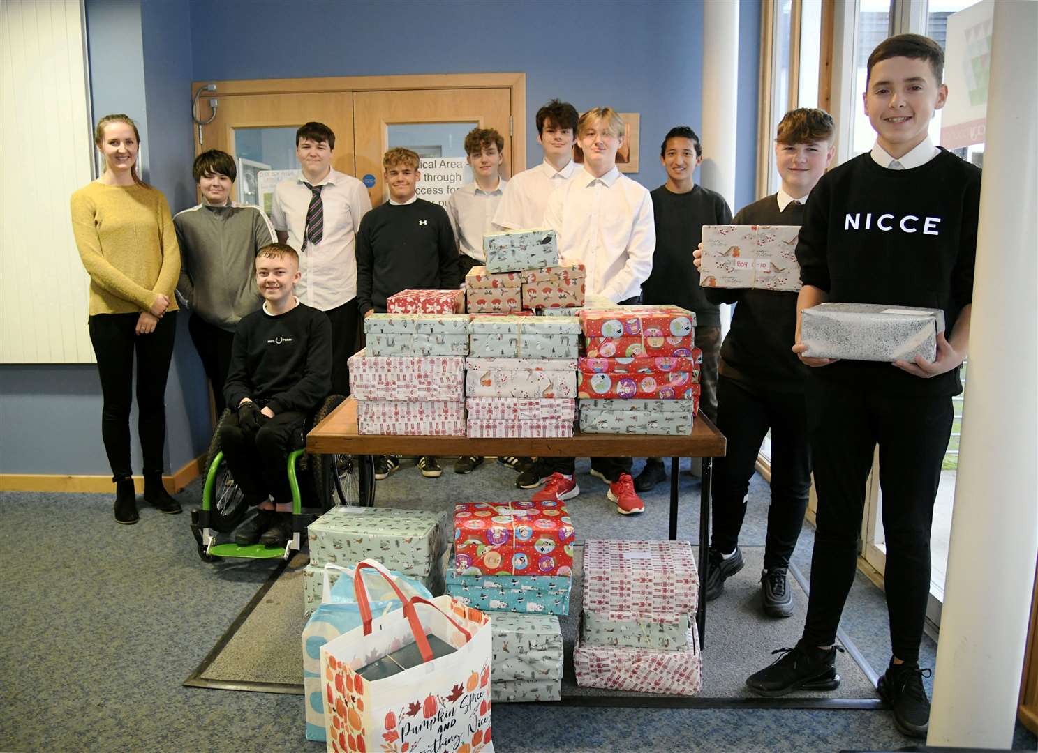 Geography teacher Miss Catriona MacLean and some of the pupils who donated shoeboxes. Picture: Beth Taylor