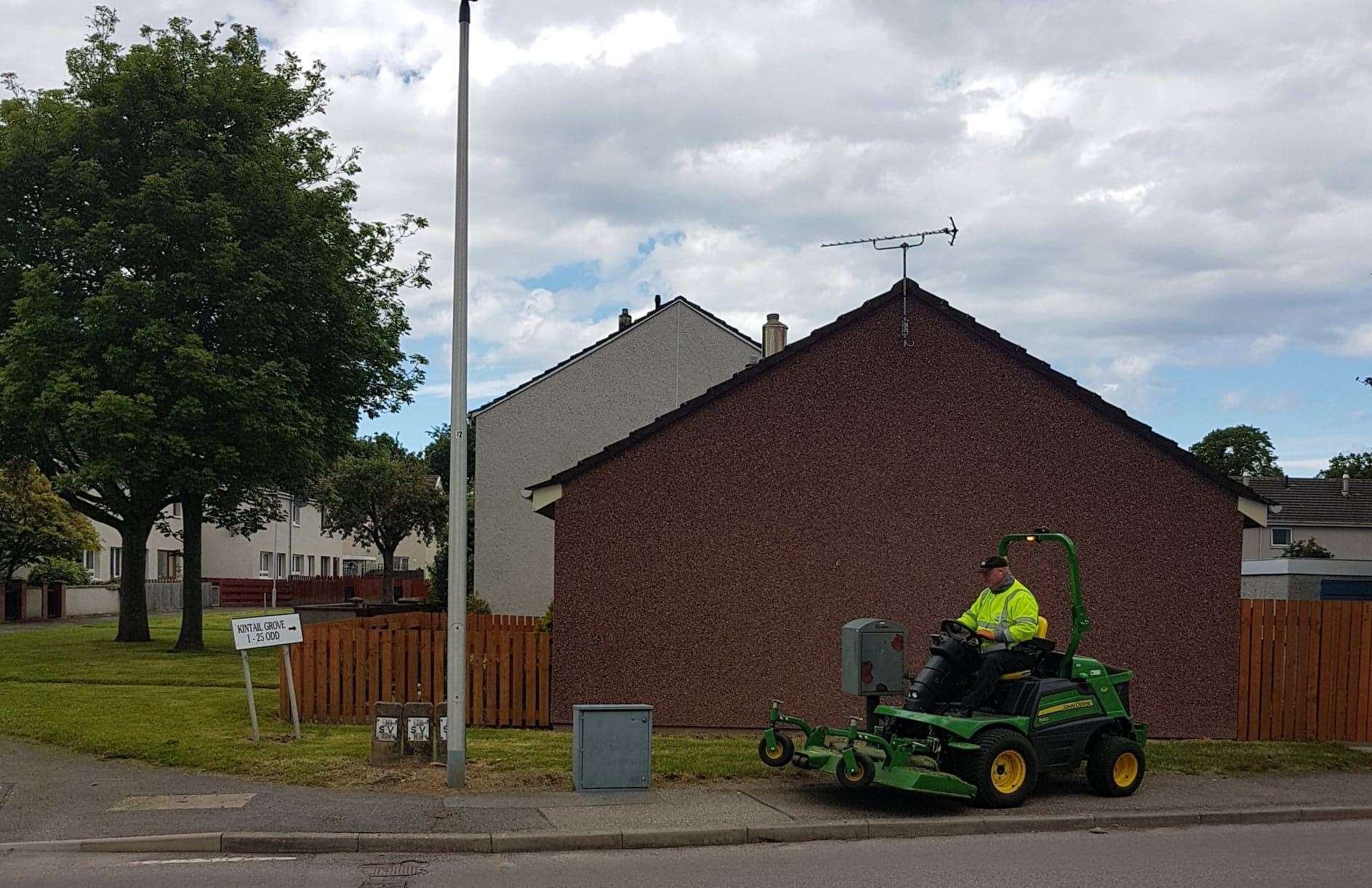 A Moray Council mower working in Thornhill.