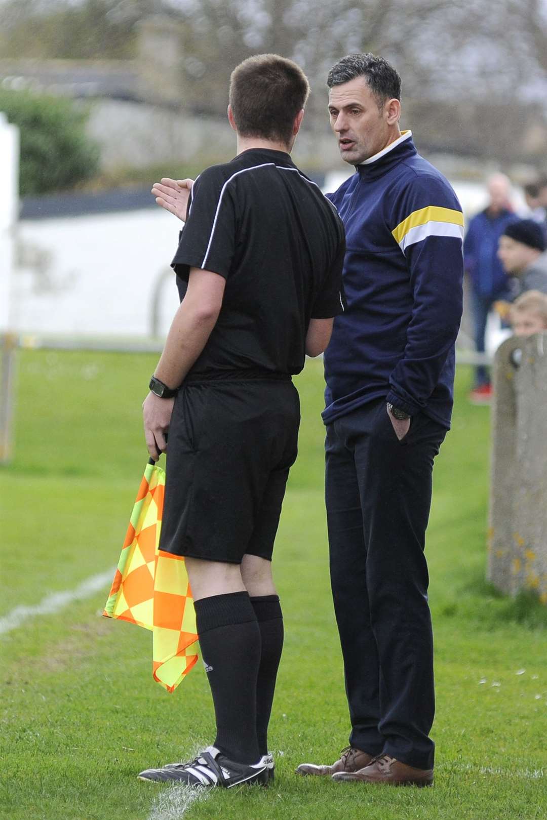 Forres Mechanics manager Charlie Rowley gets his point over to the assistant ref after a dubious penalty decision...Picture: Daniel Forsyth. Image No.037206.