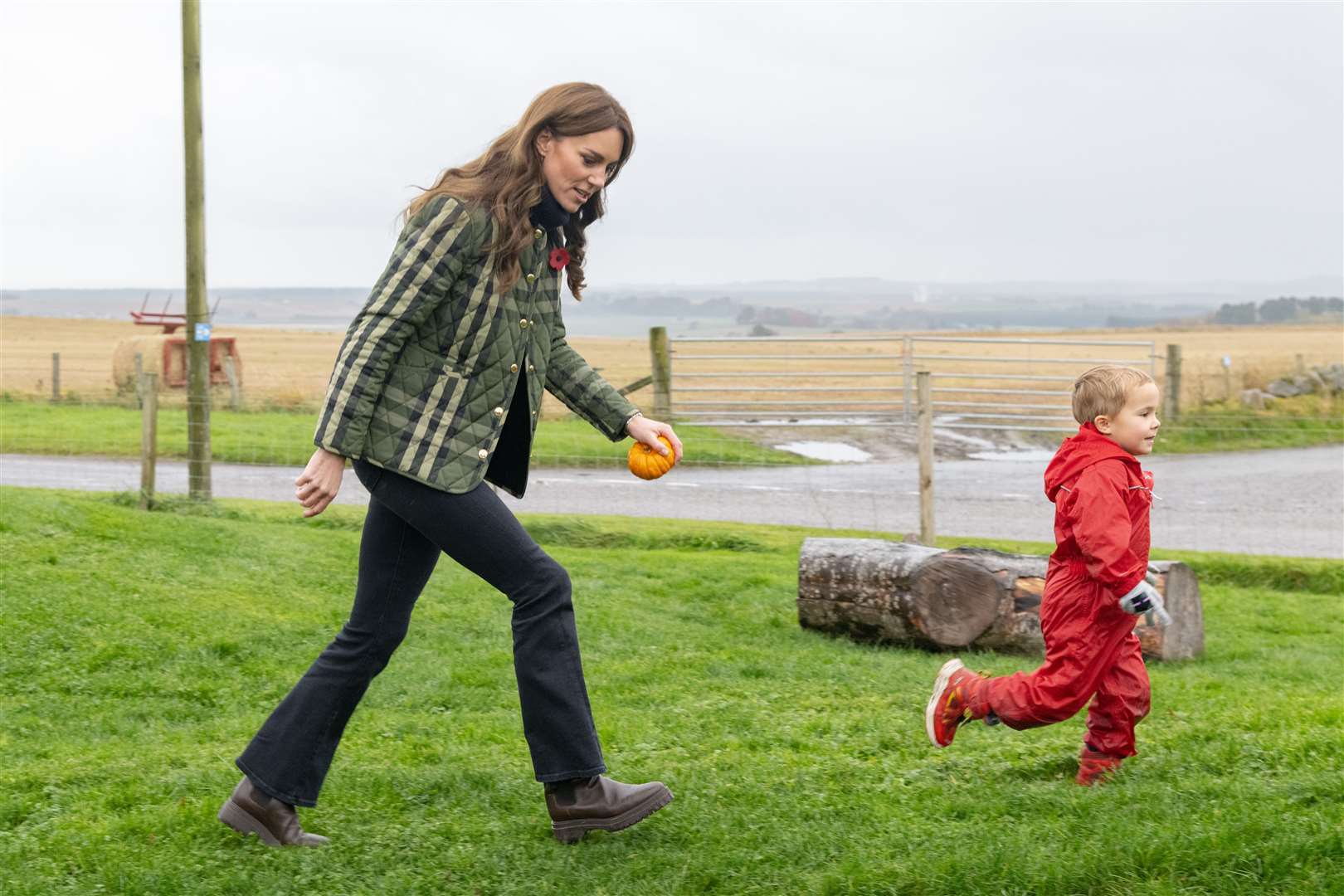 Four-year-old Oscar Blackburn helps Princess Kate complete a pumpkin trail at Brodieshill Farm. Picture: Beth Taylor