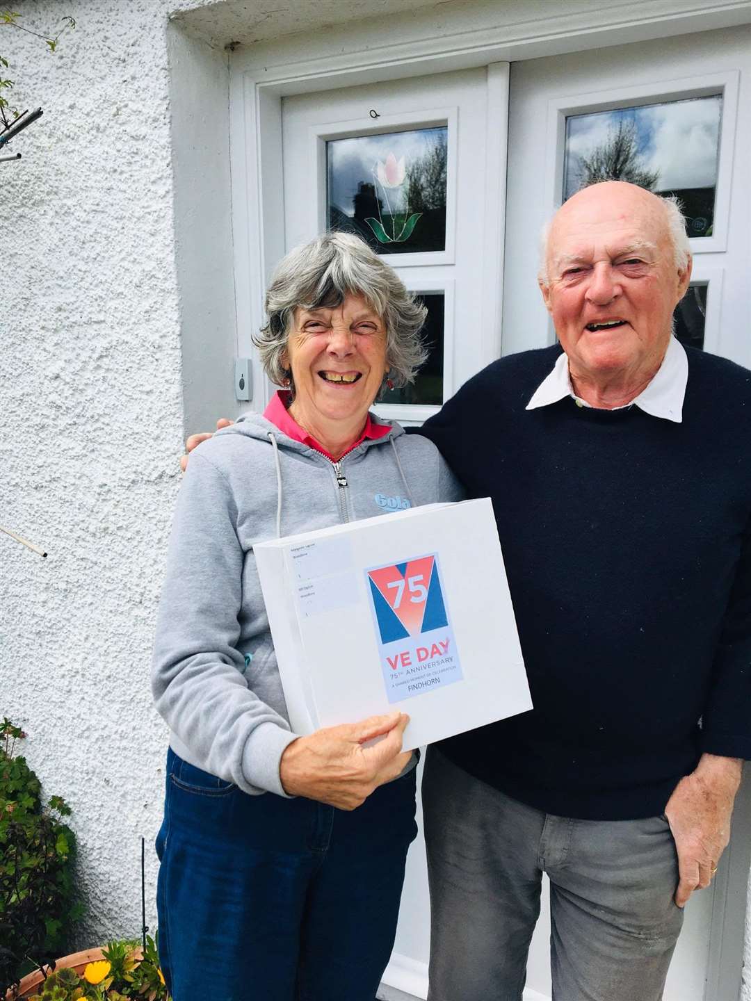 Margaret and Bill Ogilvie with their VE Day box.