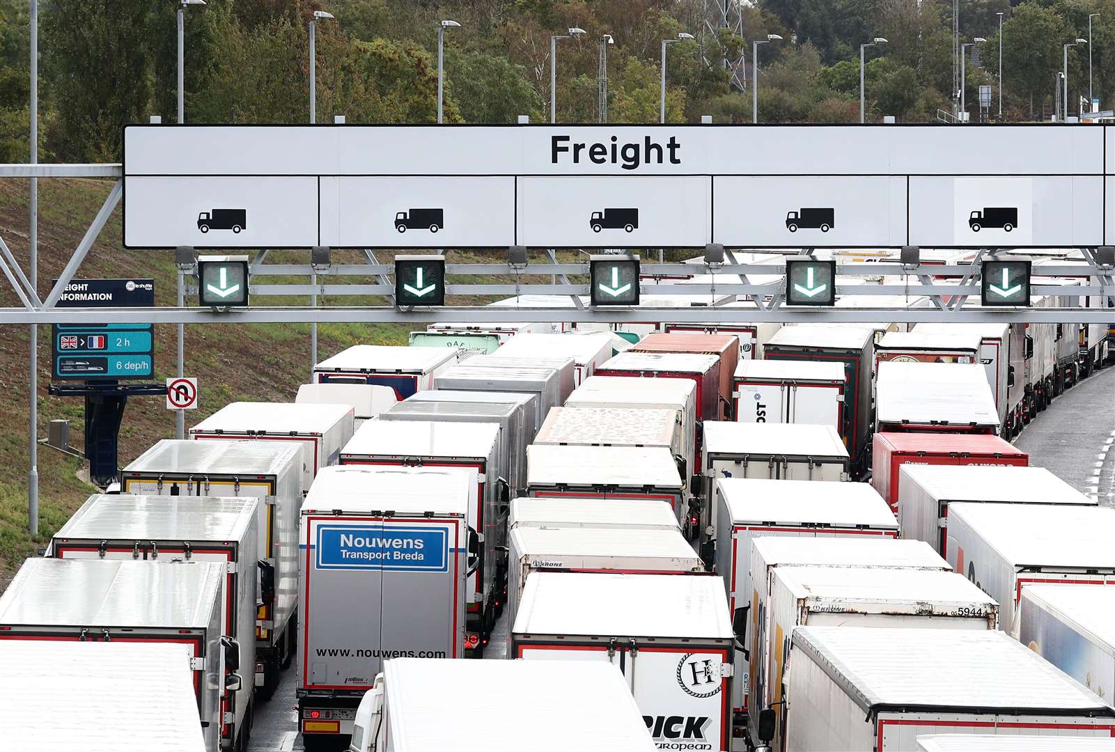 Trucks queuing for Eurotunnel in Folkestone, as the Government is developing a 27-acre site near Ashford into a post-Brexit lorry park (Gareth Fuller/PA)