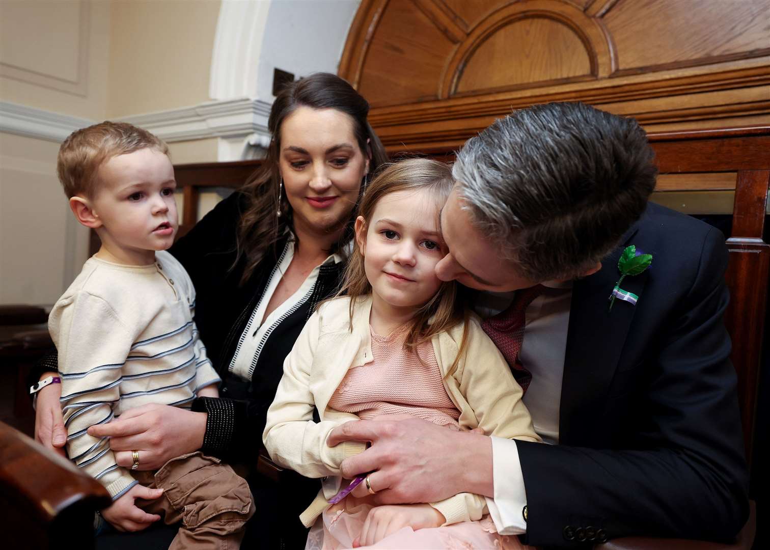 Taoiseach Simon Harris with his wife Caoimhe and children Cillian and Saoirse in the Dail Chamber (Maxwell Photography/PA)