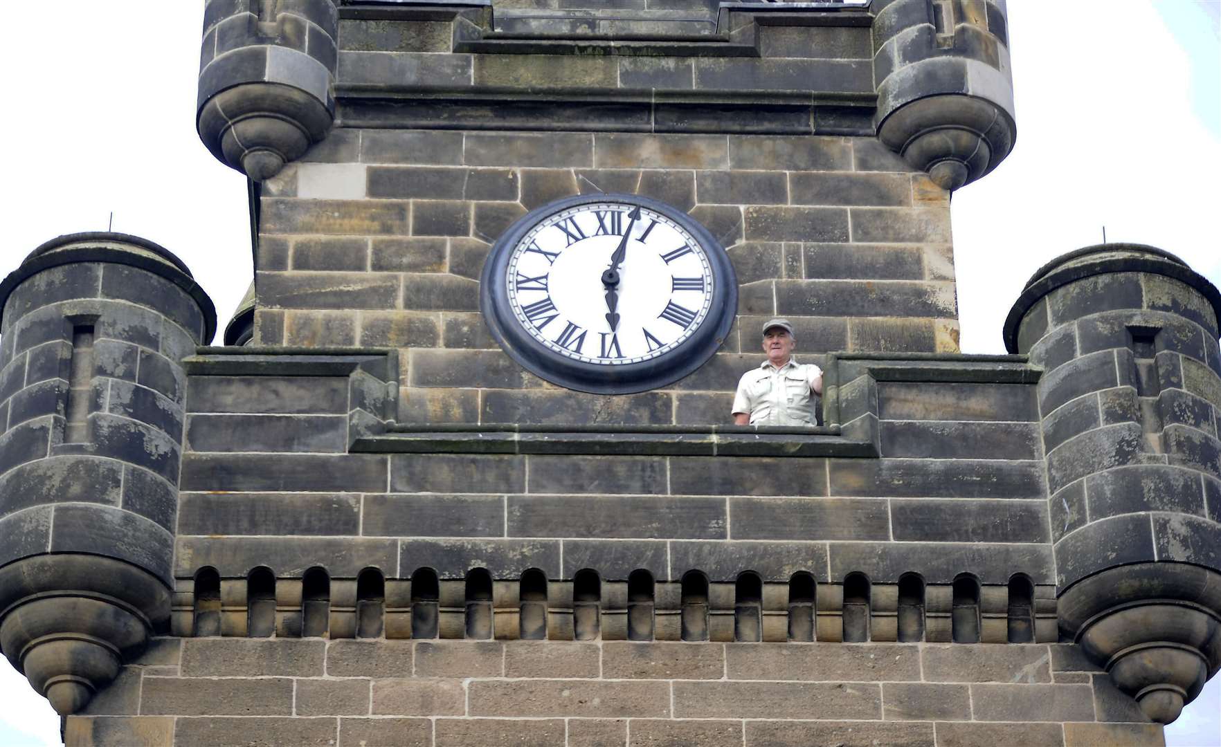 George Alexander on the clocktower at Forres Tolbooth.