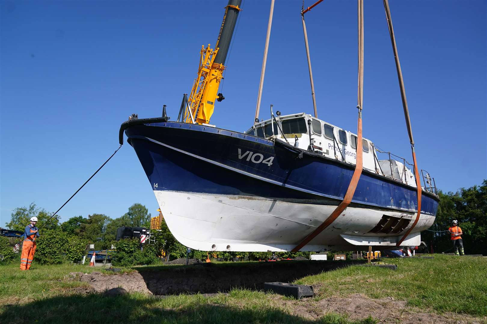 The former lifeboat being lowered into position at its new home (Andrew Milligan/PA)