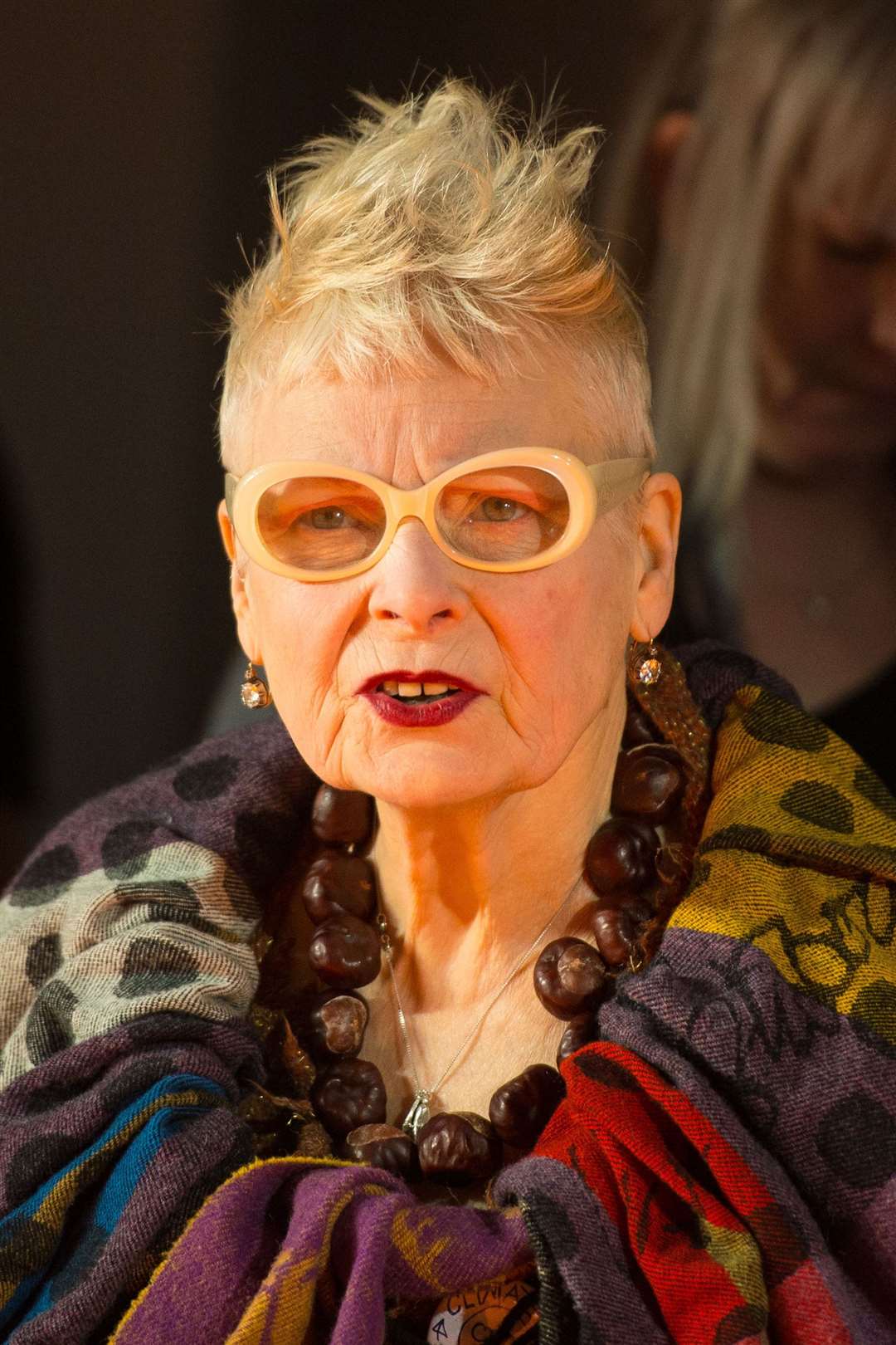 Dame Vivienne Westwood watches a London Fashion Week rehearsal backstage in 2015 (Dominic Lipinski/PA)