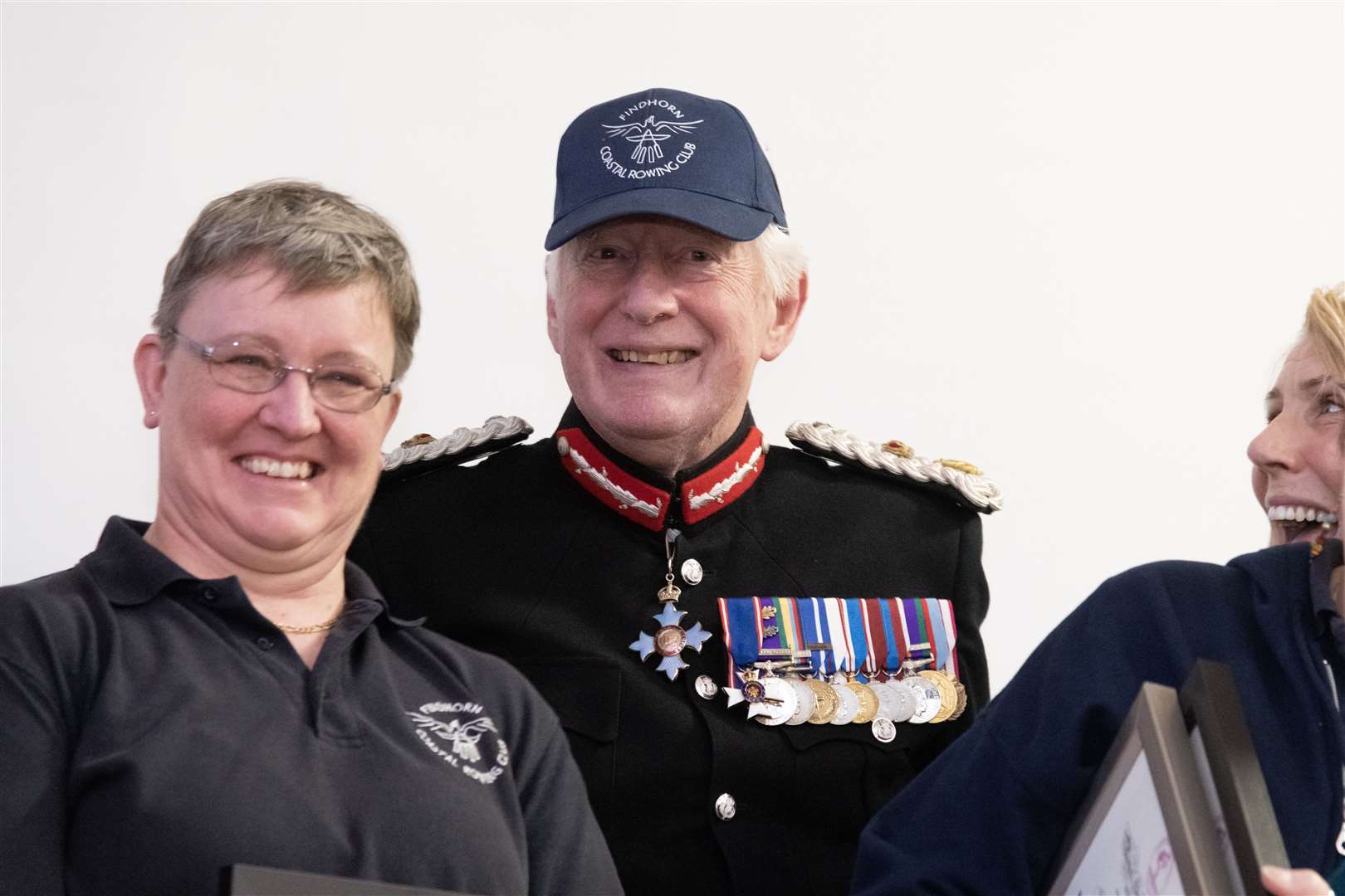 Crewmate Jackie King and Major General Seymour Monro proudly sporting a Findhorn Coastal Rowing Club cap. Picture: Beth Taylor