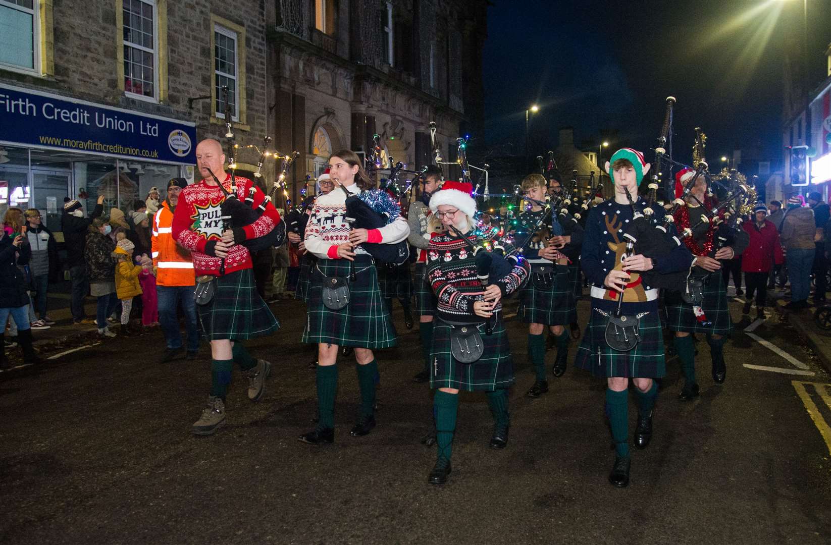 Forres and District Pipe Band are no longer playing at the Cross on Hogmanay.