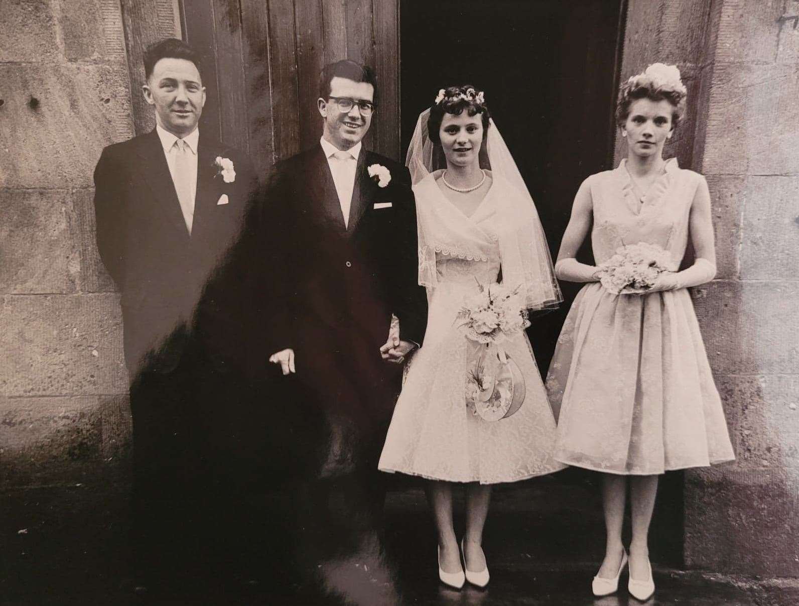 The happy couple (centre) with Eleaner’s sister Elsie and her husband Gordon Wink on their wedding day 60 years ago.