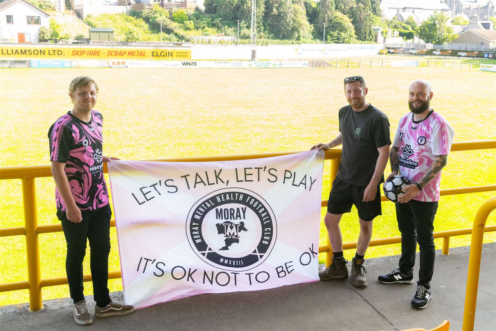 Phil, Steven and Matty at Mosset Park delivering the message "It is OK to not be OK". Picture: Beth Taylor