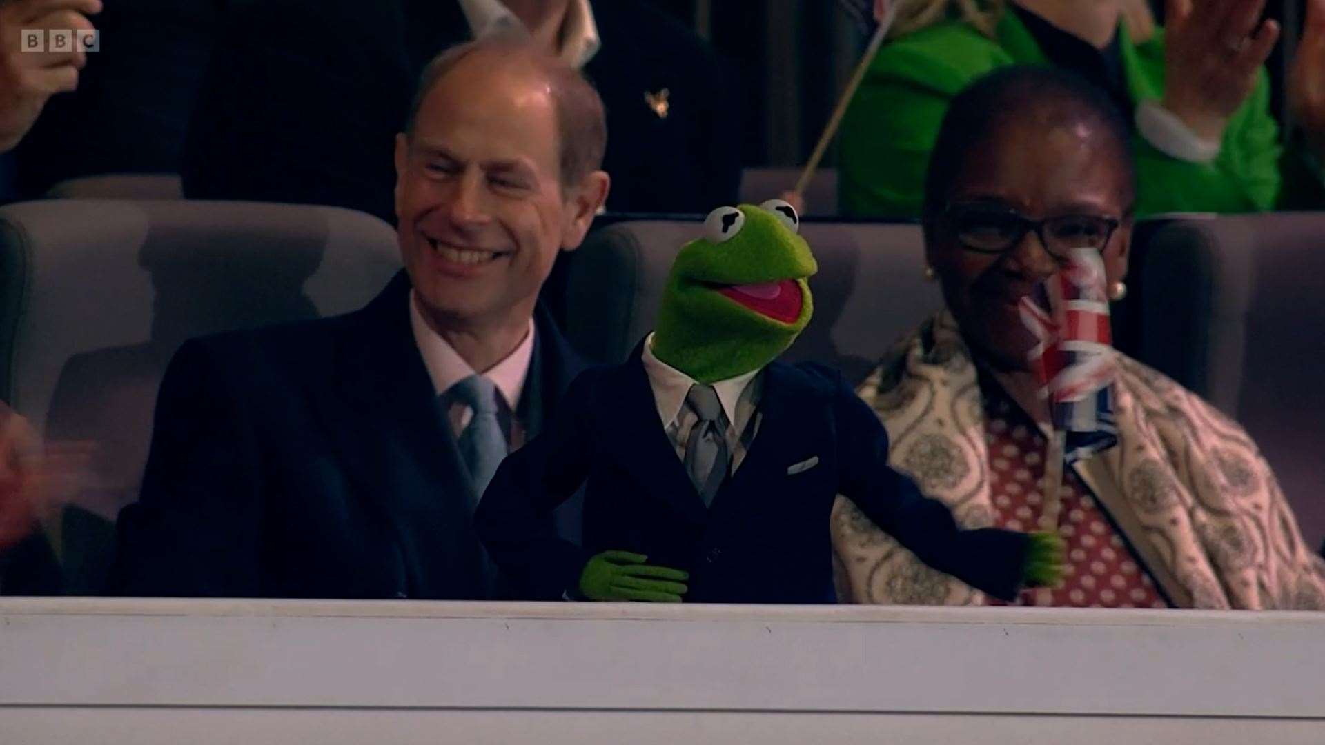The Duke of Edinburgh laughs as Kermit the frog enters the royal box (Screengrab/PA)