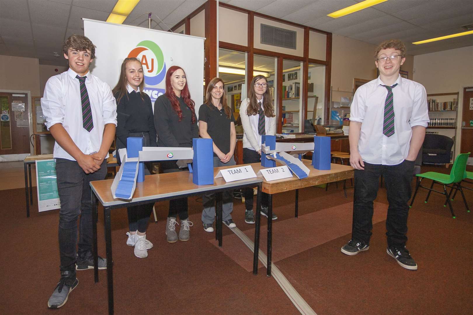 Secondary school teacher sponsor, AJ Engineering, regularly supports school activities. A previous project saw the company work with Forres Academy pupils. Pictured (centre) are former graduate apprentice Laura Mair and quality manager Jazmin Kellas.