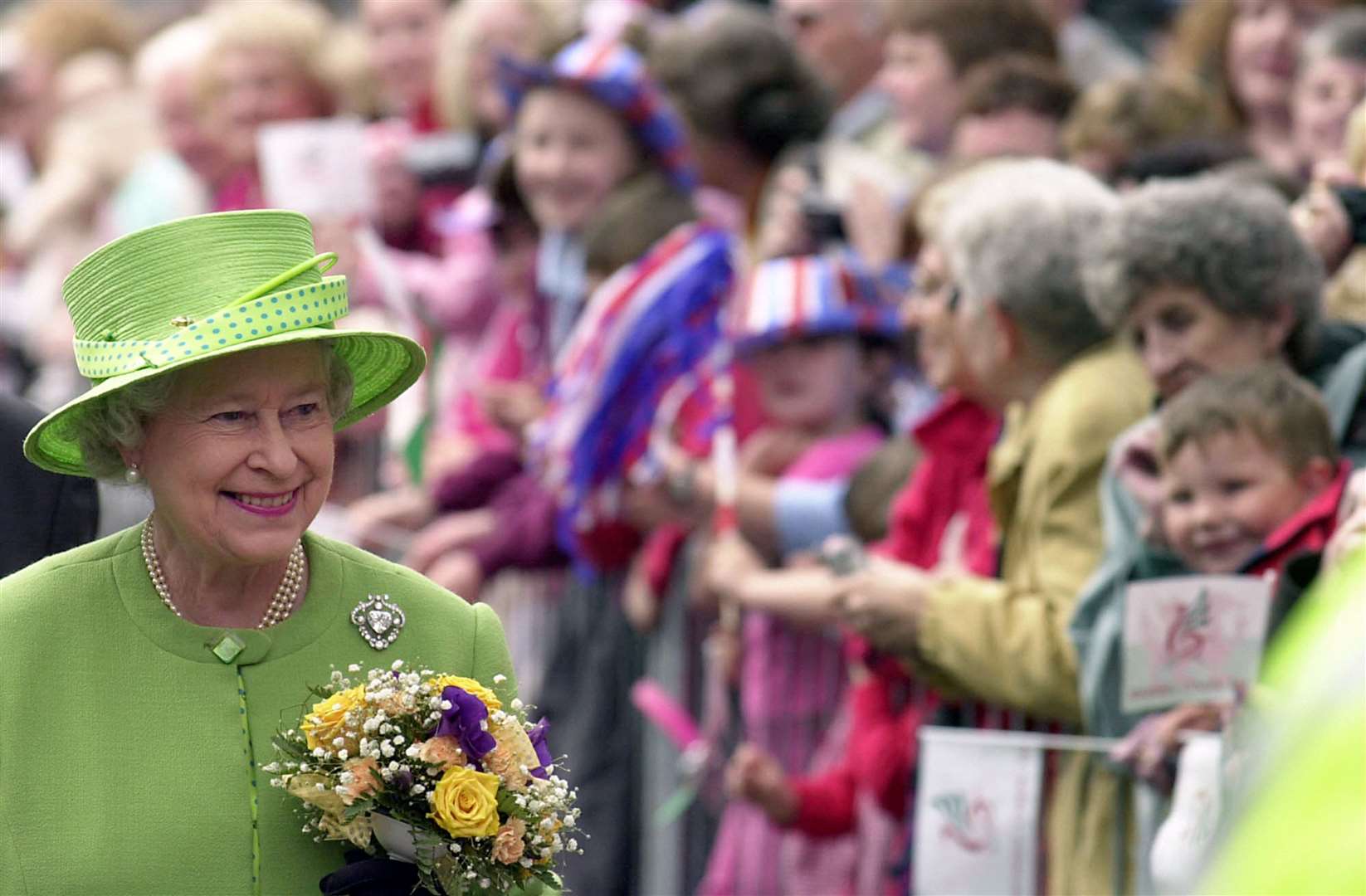 Britain’s Queen Elizabeth II visits the old mining village of Treorchy in south Wales on her Golden Jubilee tour (Barry Batchelor/PA)