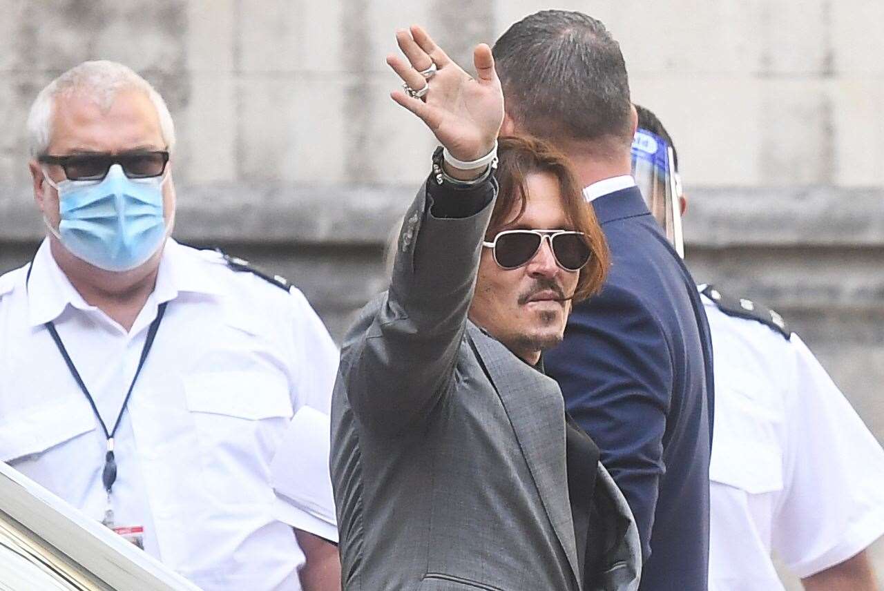 Depp leaves the High Court in London following the final day of hearings in his libel case against the publishers of The Sun (Victoria Jones/PA)