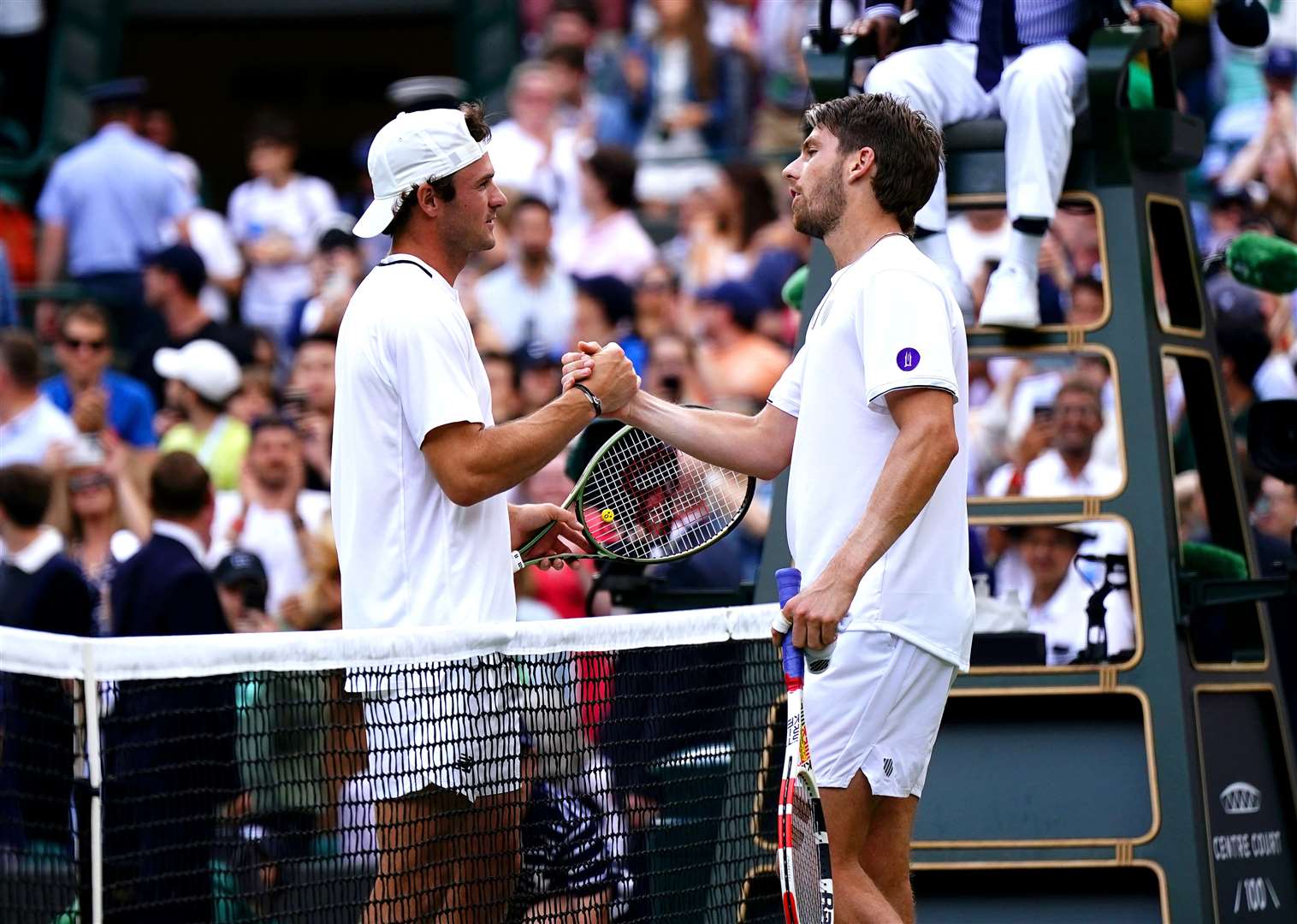 Cameron Norrie shakes hands with Tommy Paul after defeating him (Aaron Chown/PA)